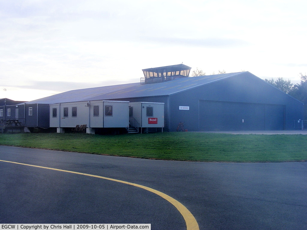 Welshpool Airport, Welshpool, Wales United Kingdom (EGCW) - looking back at the main hangar at Welshpool with the old tower on top