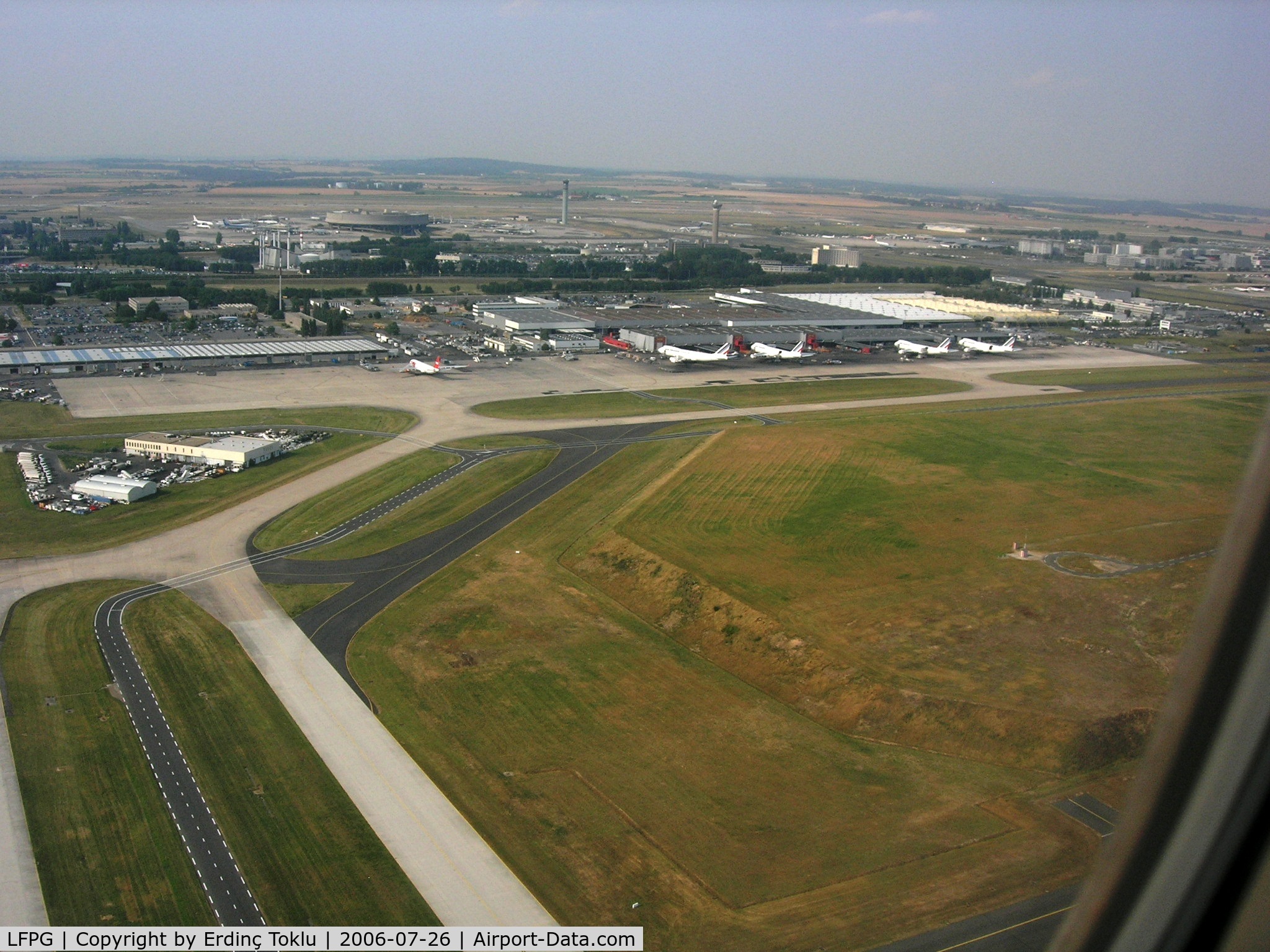 Paris Charles de Gaulle Airport (Roissy Airport), Paris France (LFPG) - On short final Rwy 08R at CDG-Maintenance area