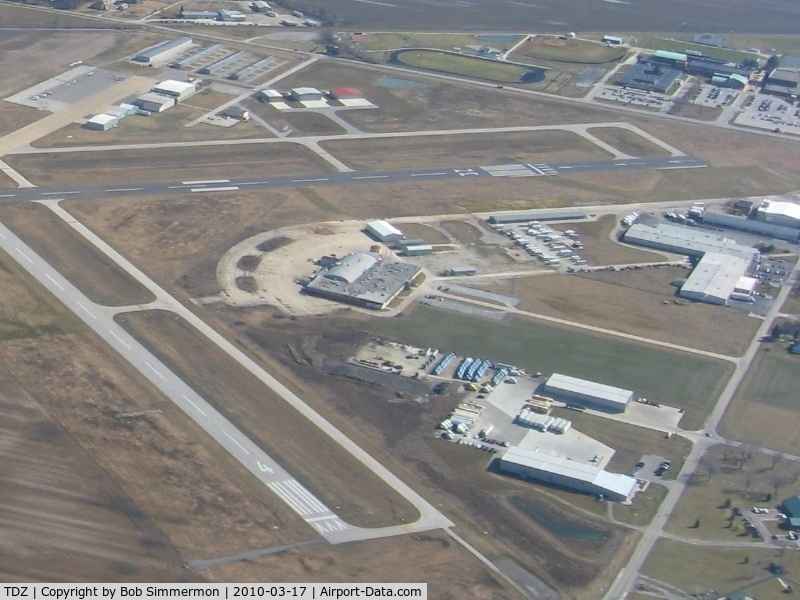 Toledo  Executive Airport (TDZ) - Old terminal in the foreground with newer facilities beyond.