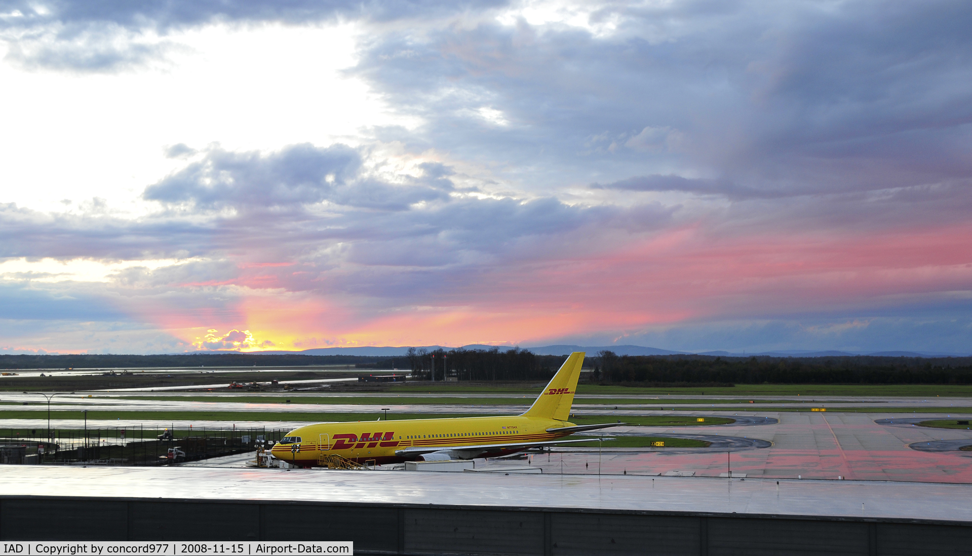 Washington Dulles International Airport (IAD) - Stormy sunset west of KIAD on 11/15/2008.  N775AX in the foreground.