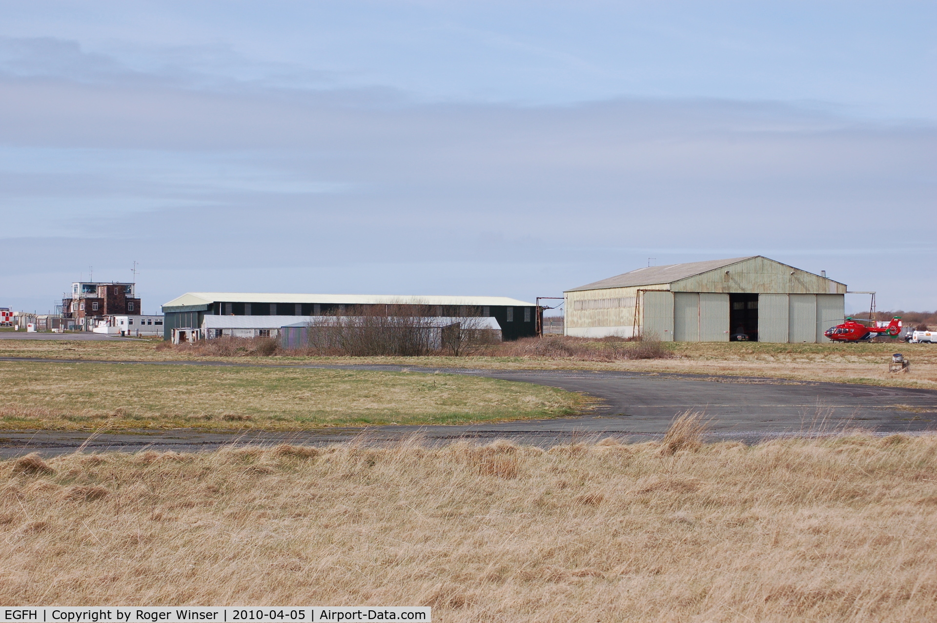 Swansea Airport, Swansea, Wales United Kingdom (EGFH) - View of the airport's Bellman (Hangar 2) and B1 (Hangar 1) type hangars 