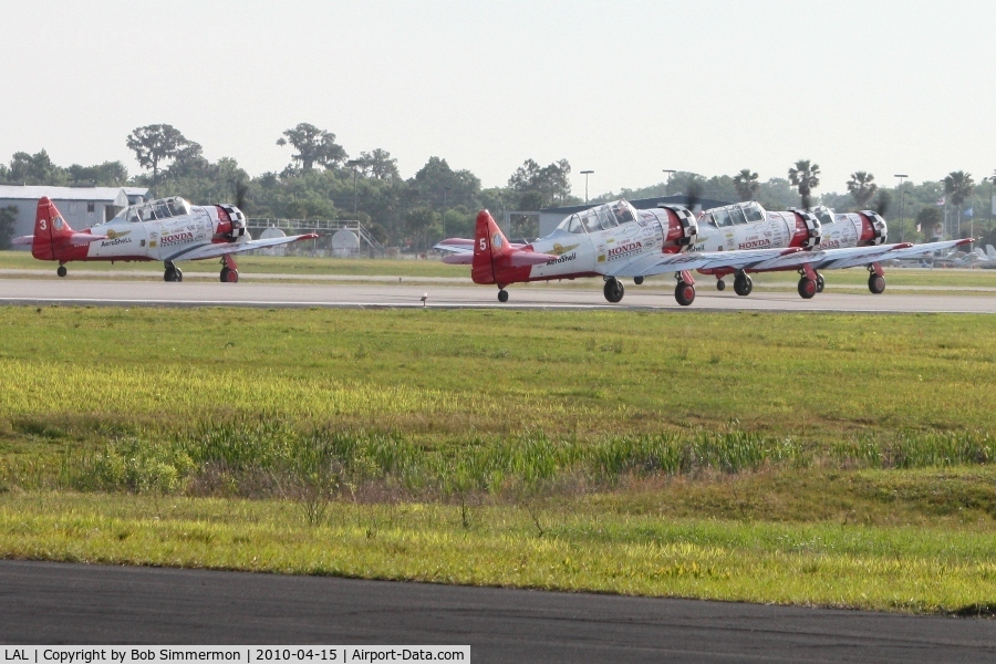 Lakeland Linder Regional Airport (LAL) - Aeroshell Team AT-6's departing RWY 9.
