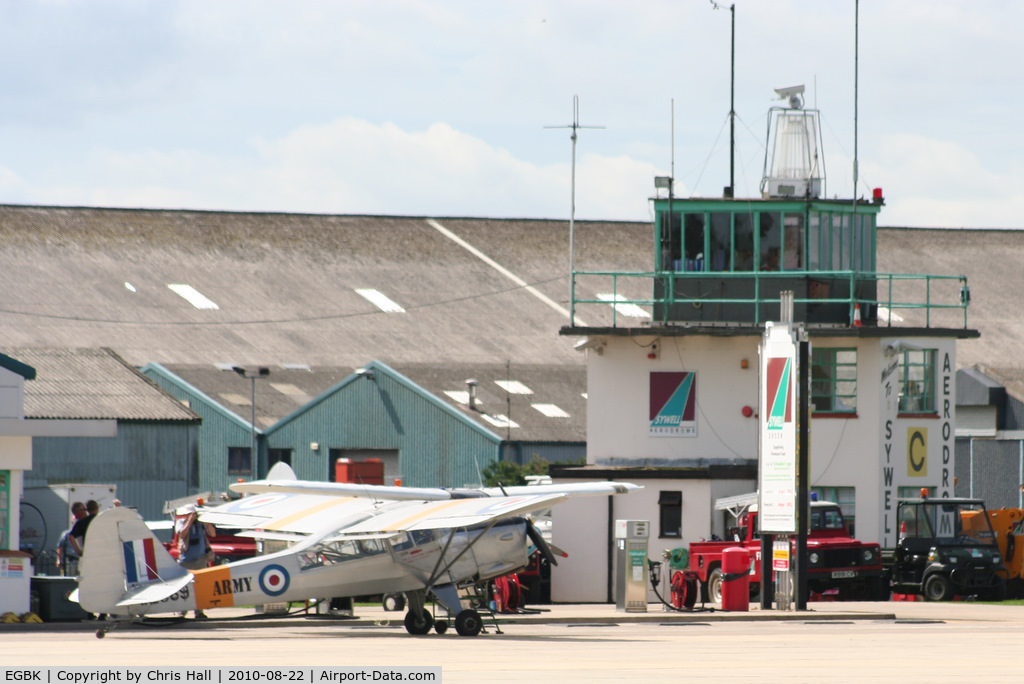 Sywell Aerodrome Airport, Northampton, England United Kingdom (EGBK) - Sywell Tower with Beagle A.61 Terrier at the fuel pumps