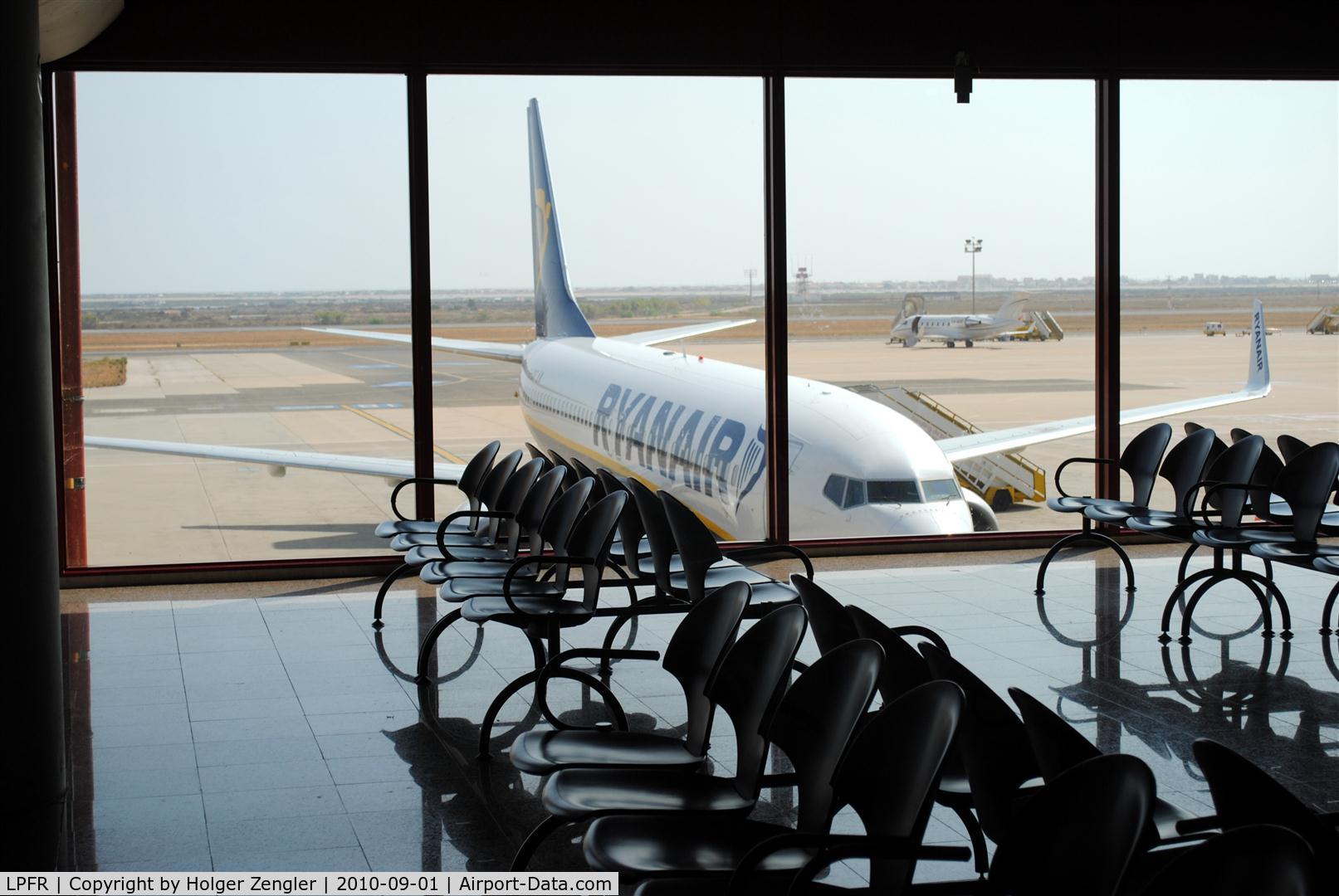 Faro Airport, Faro Portugal (LPFR) - View to apron thru a boarding room