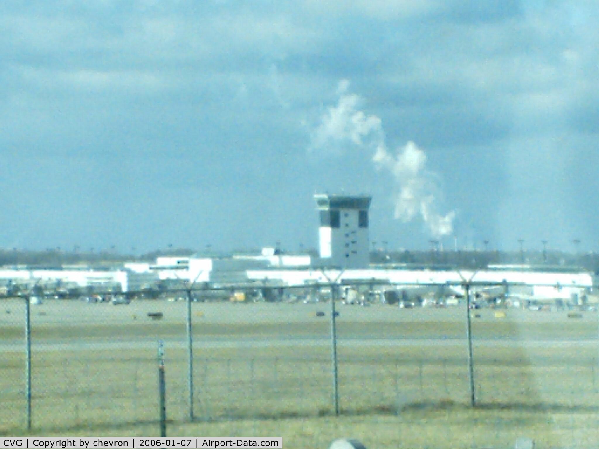 Cincinnati/northern Kentucky International Airport (CVG) - pic taken from viewing area at CVG, smoke in the background is from a power plant , 