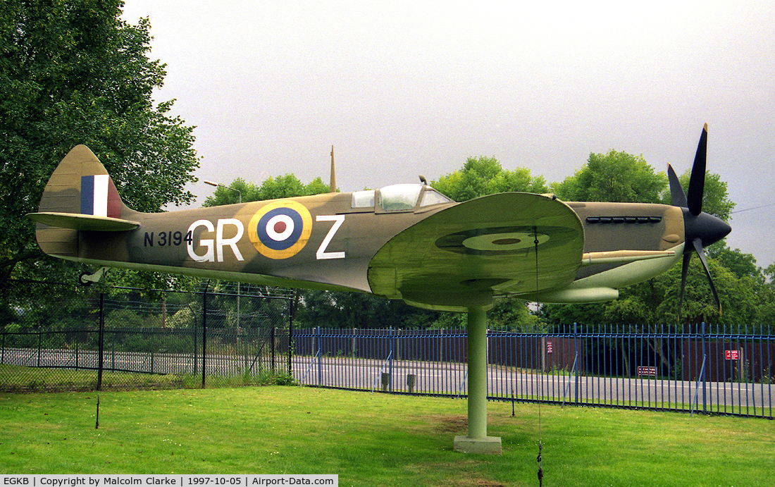London Biggin Hill Airport, London, England United Kingdom (EGKB) - Supermarine Spitfire (replica) N3194 / GR-Z. With Hurricane FSM (L1710), this Spitfire replica adorns the gate outside the RAF Memorial Chapel at Biggin Hill. Painted to represent N3194 of 92 Squadron, the top scoring squadron in the Battle of Britain.
