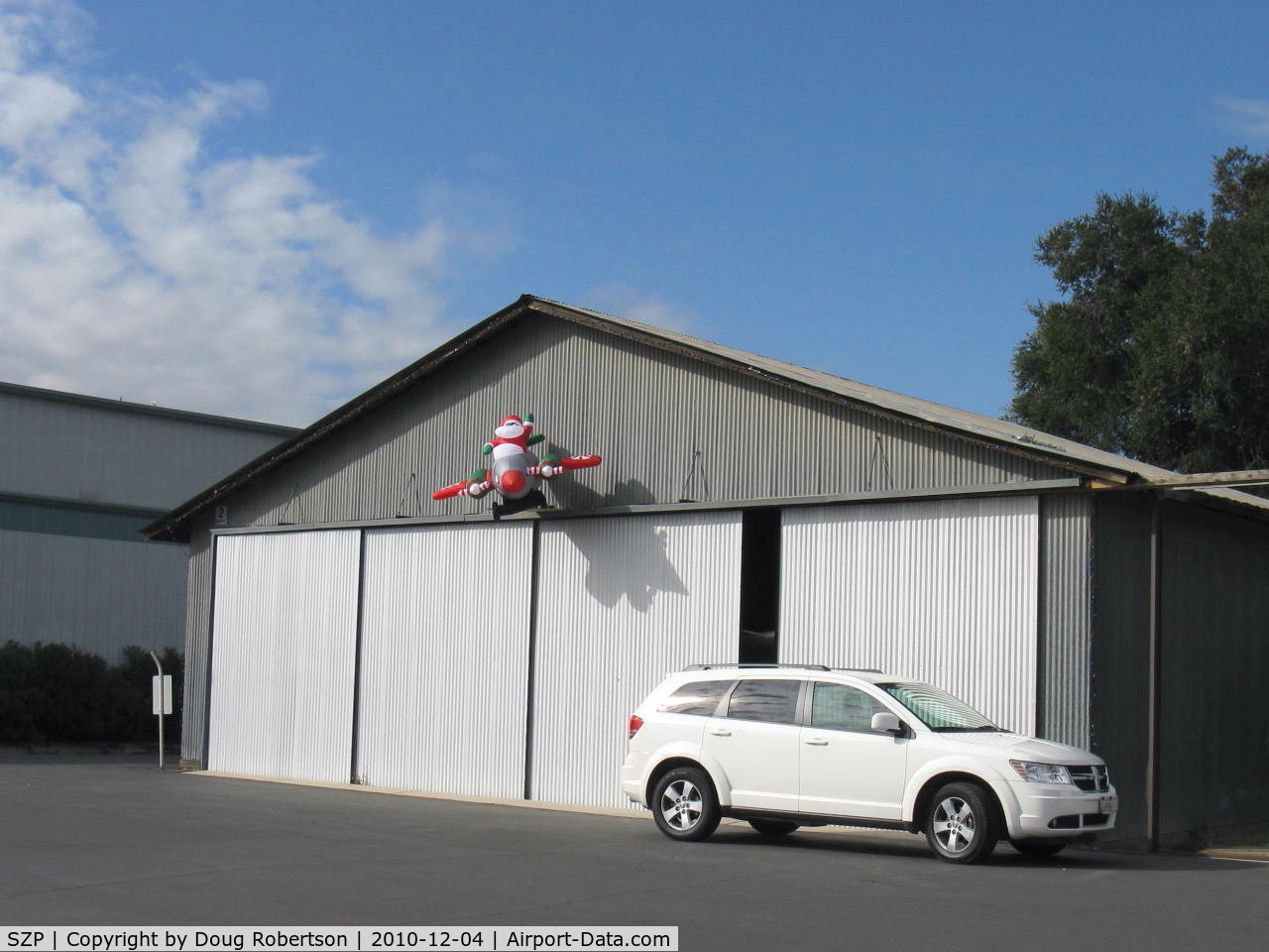 Santa Paula Airport (SZP) - Santa Claus' Flight Turning & Burning at 2 TAXI, (twin engine for reliability-the props are turning in the wind)