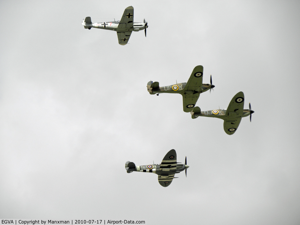 RAF Fairford Airport, Fairford, England United Kingdom (EGVA) - Me109 D-FWME, Hurricane R4118 and Spits P7350 and PL344 in Formation at RIAT 2010