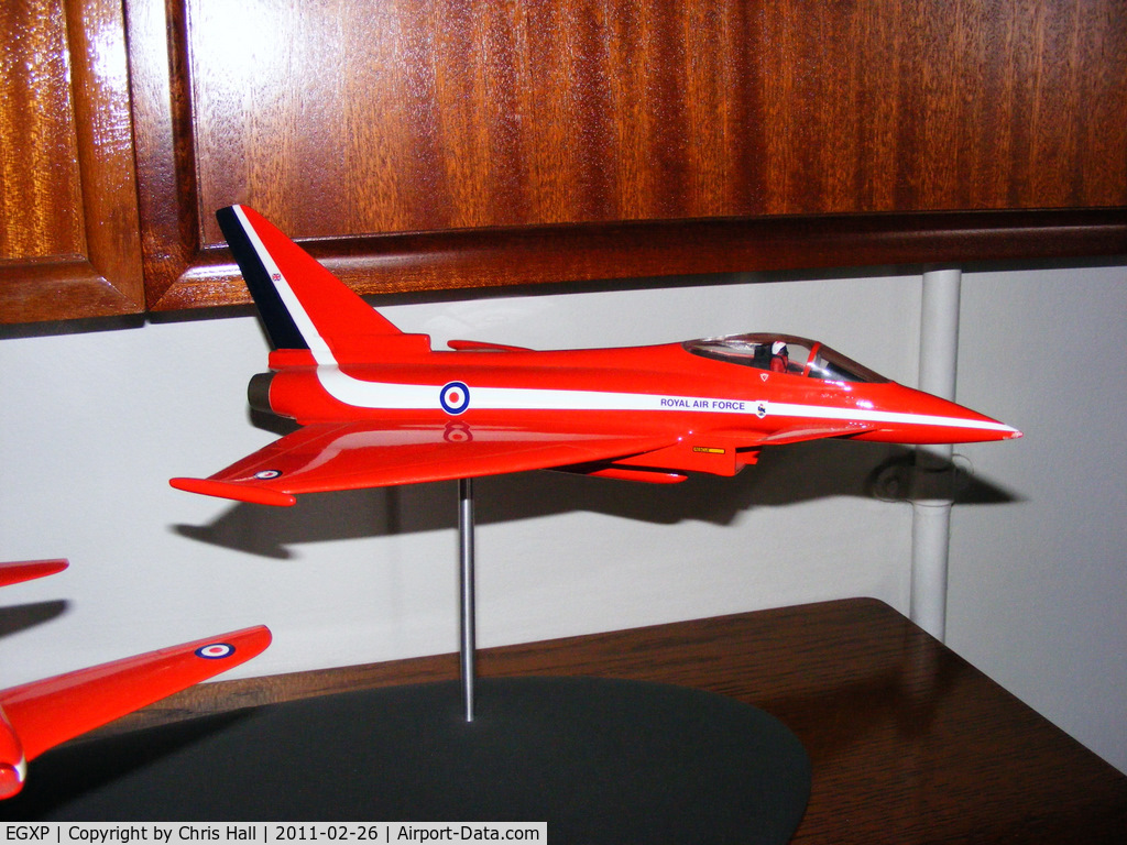 RAF Scampton Airport, Scampton, England United Kingdom (EGXP) - model of a Eurofighter Typhoon in Red Arrows colours