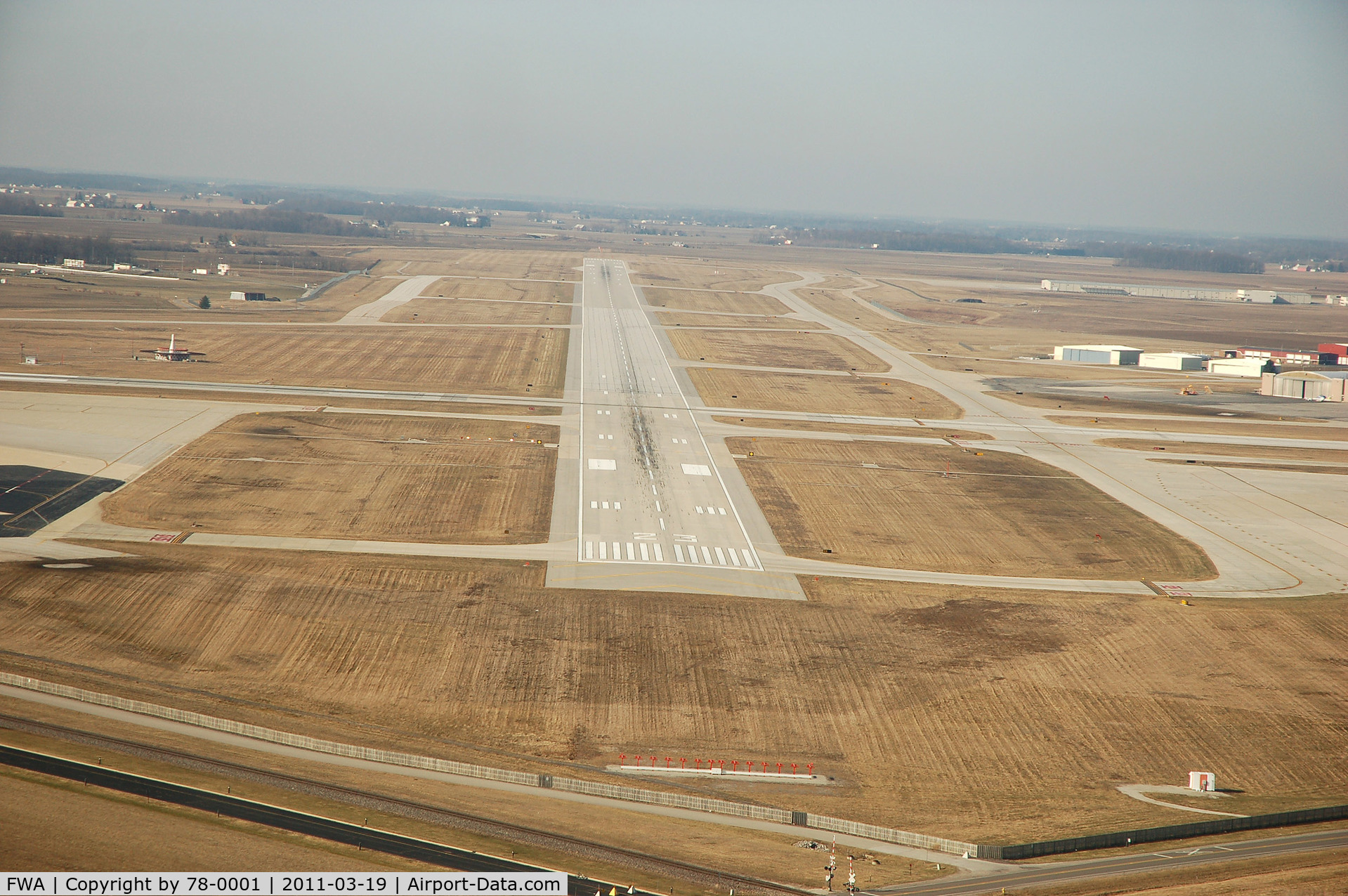 Fort Wayne International Airport (FWA) - My daughter took this photo while we were turning final for 23. My longest VFR cross country to date. We were a little high, there is also alot of runway. No reason to set it down on the first 10 feet!