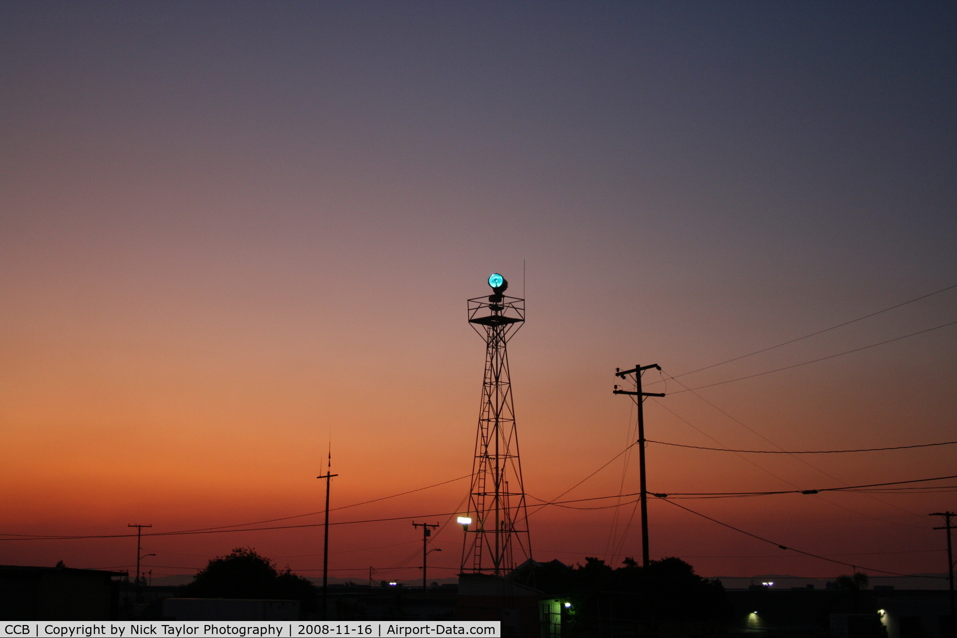 Cable Airport (CCB) - Taken just before sunrise as the Yorba Linda hills burned to the South giving the sky an eerie orange glow.