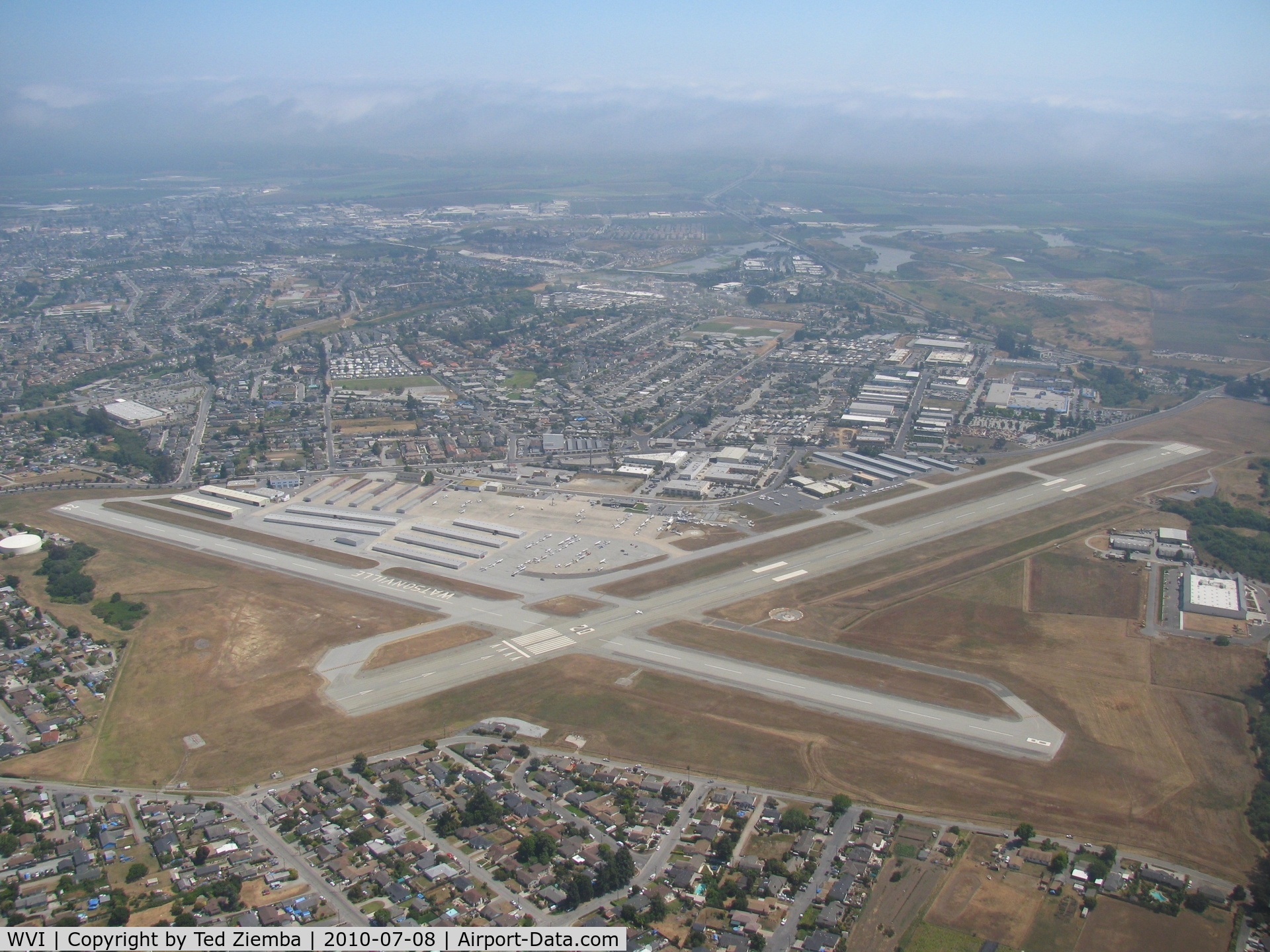 Watsonville Municipal Airport (WVI) - A view of Watsonville Municipal Airport on a right downwind departure for runway 20. 