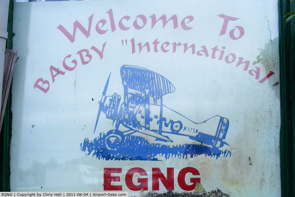 EGNG Airport - in the window of the clubhouse at Bagby airfield