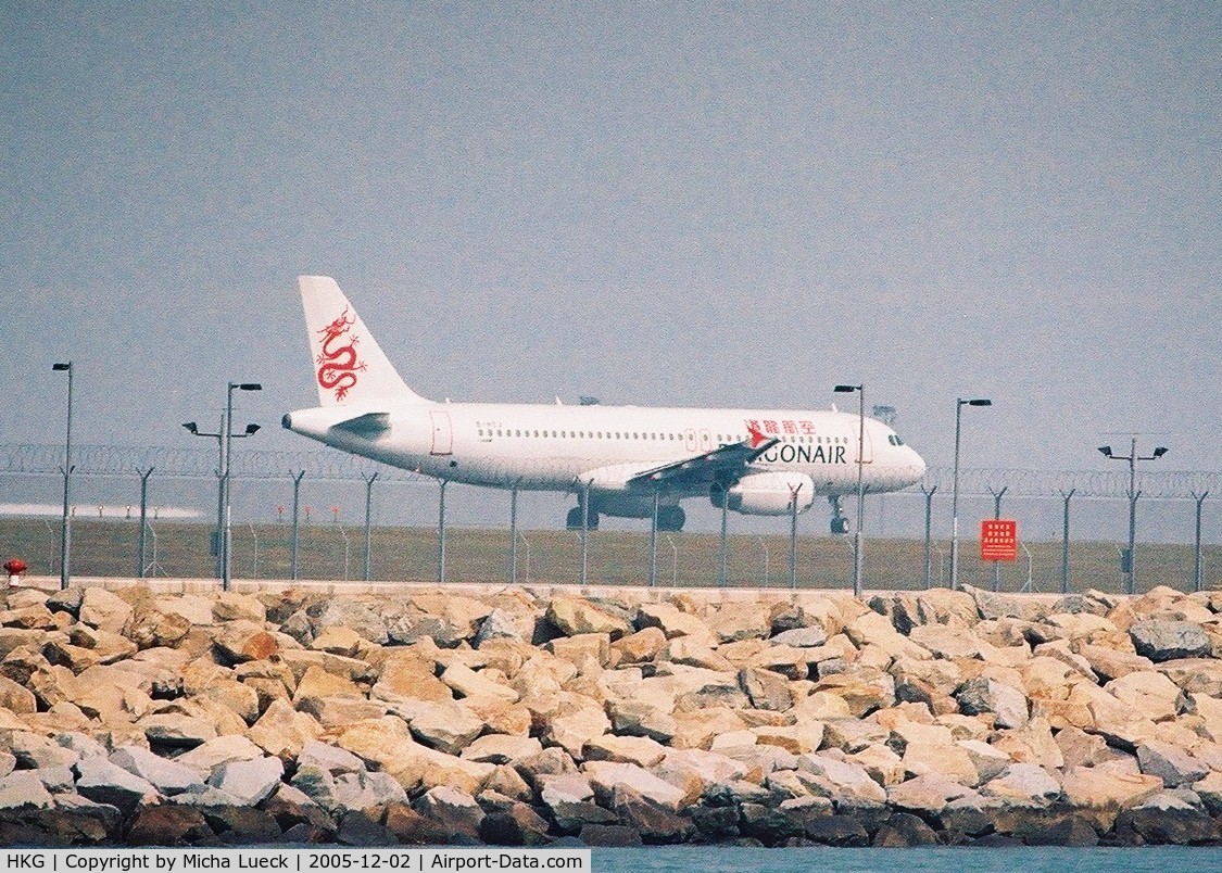 Hong Kong International Airport, Hong Kong Hong Kong (HKG) - A 320 of Dragon Air accelerating for take-off