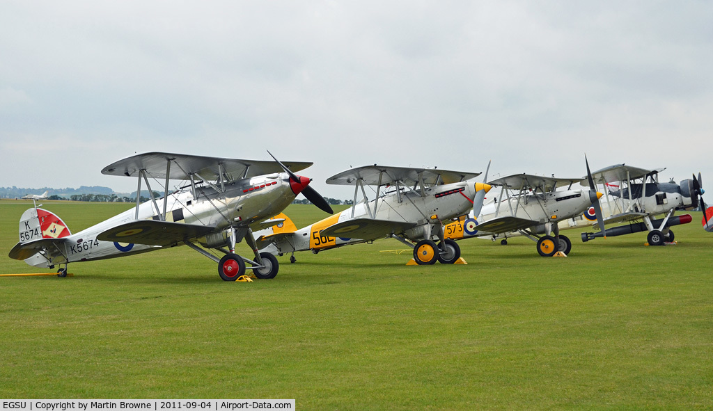 Duxford Airport, Cambridge, England United Kingdom (EGSU) - PART OF THE FLIGHTLINE AT THE 75TH ANNIVERSARY OF THE SPITFIRE AIRSHOW.