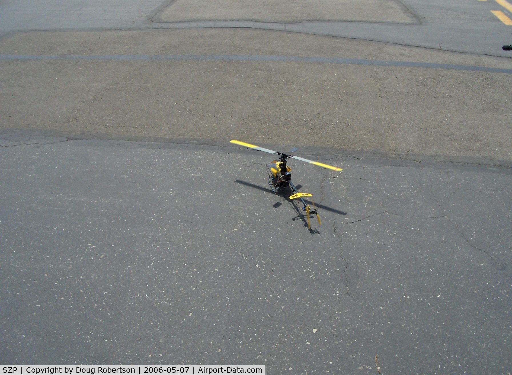 Santa Paula Airport (SZP) - T-REX radio-controlled  helicopter, building rotor revs for takeoff