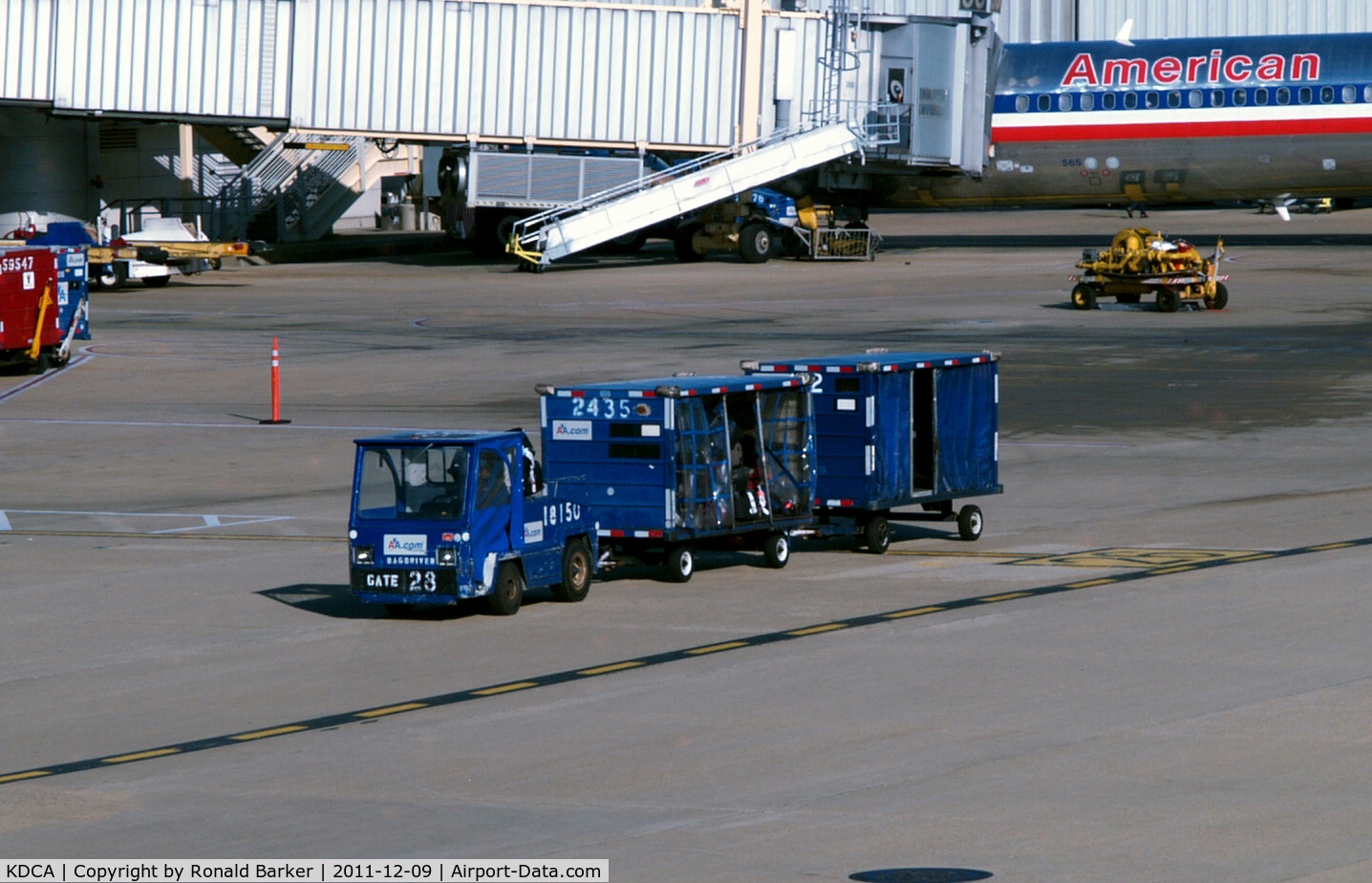 Ronald Reagan Washington National Airport (DCA) - Tug with # 18150 baggage carts on the ramp
