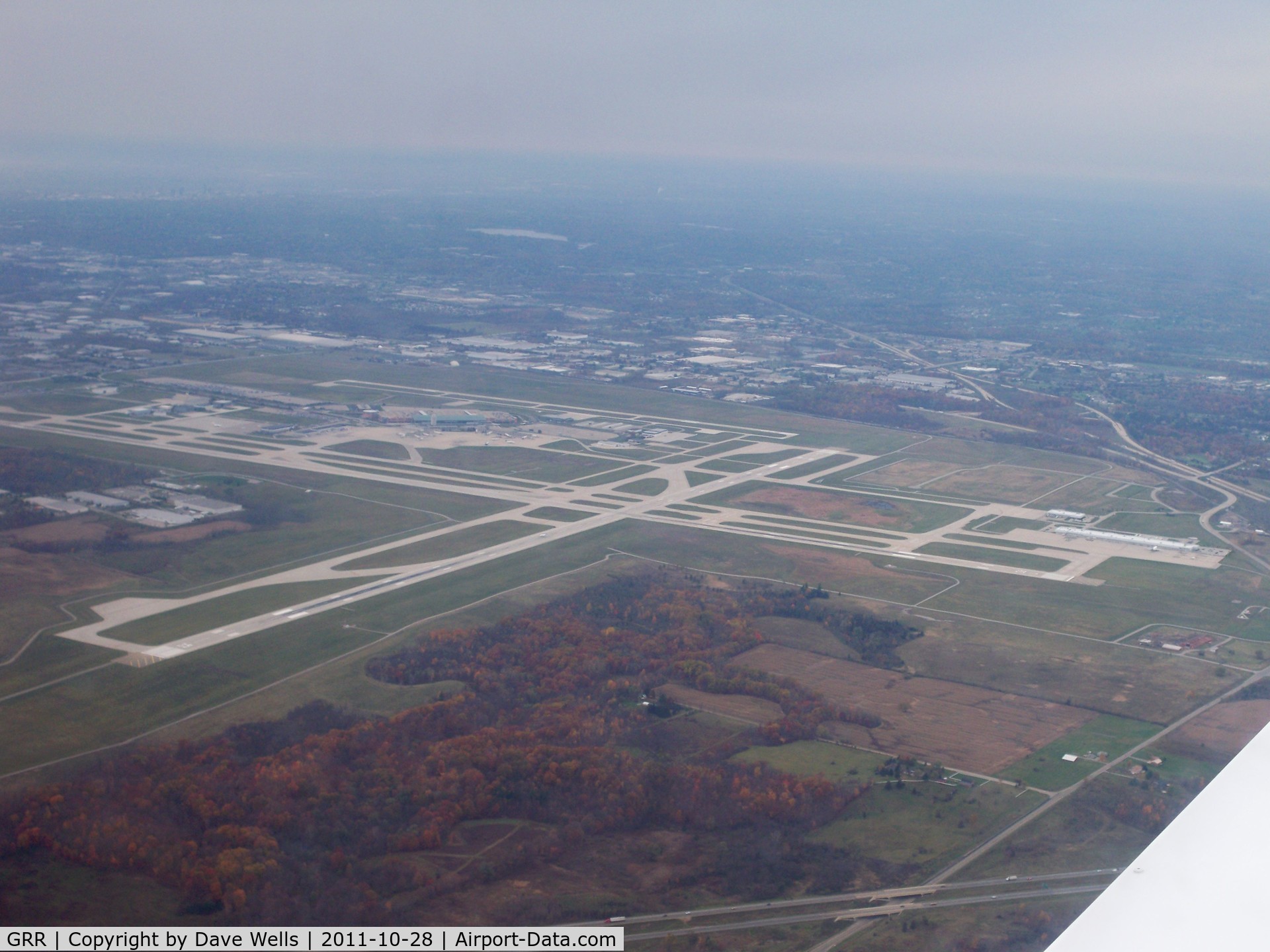 Gerald R. Ford International Airport (GRR) - View of Grand Rapids airport from the South East, runway 35 is at the lower left, runway 26L is on the right hand side.