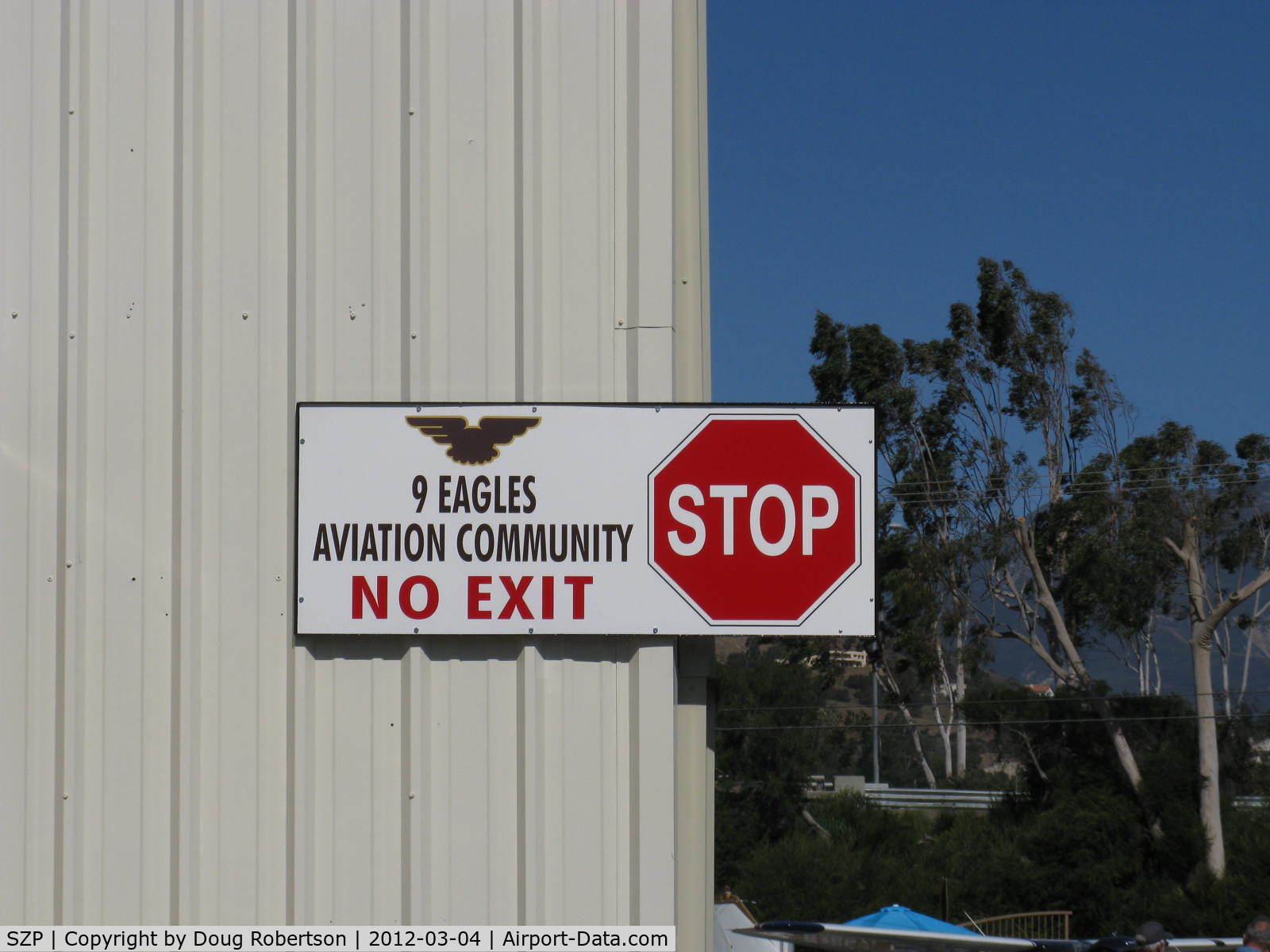 Santa Paula Airport (SZP) - 9 Eagles Aviation Community hangars. Entry warning of cul-de-sac
