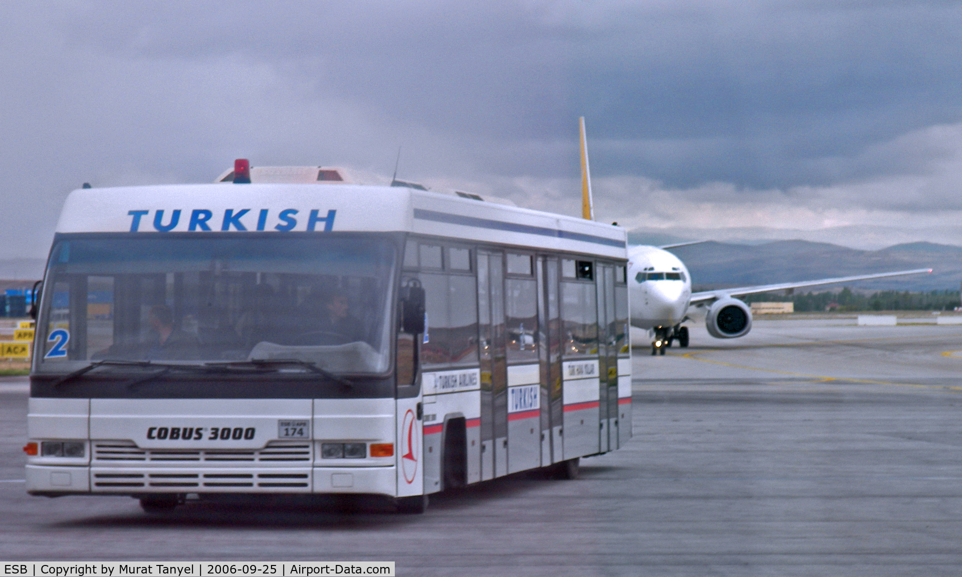 Ankara Esenbo?a International Airport, Ankara Turkey (ESB) - A Pegasus B737 in hot pursuit of a THY bus