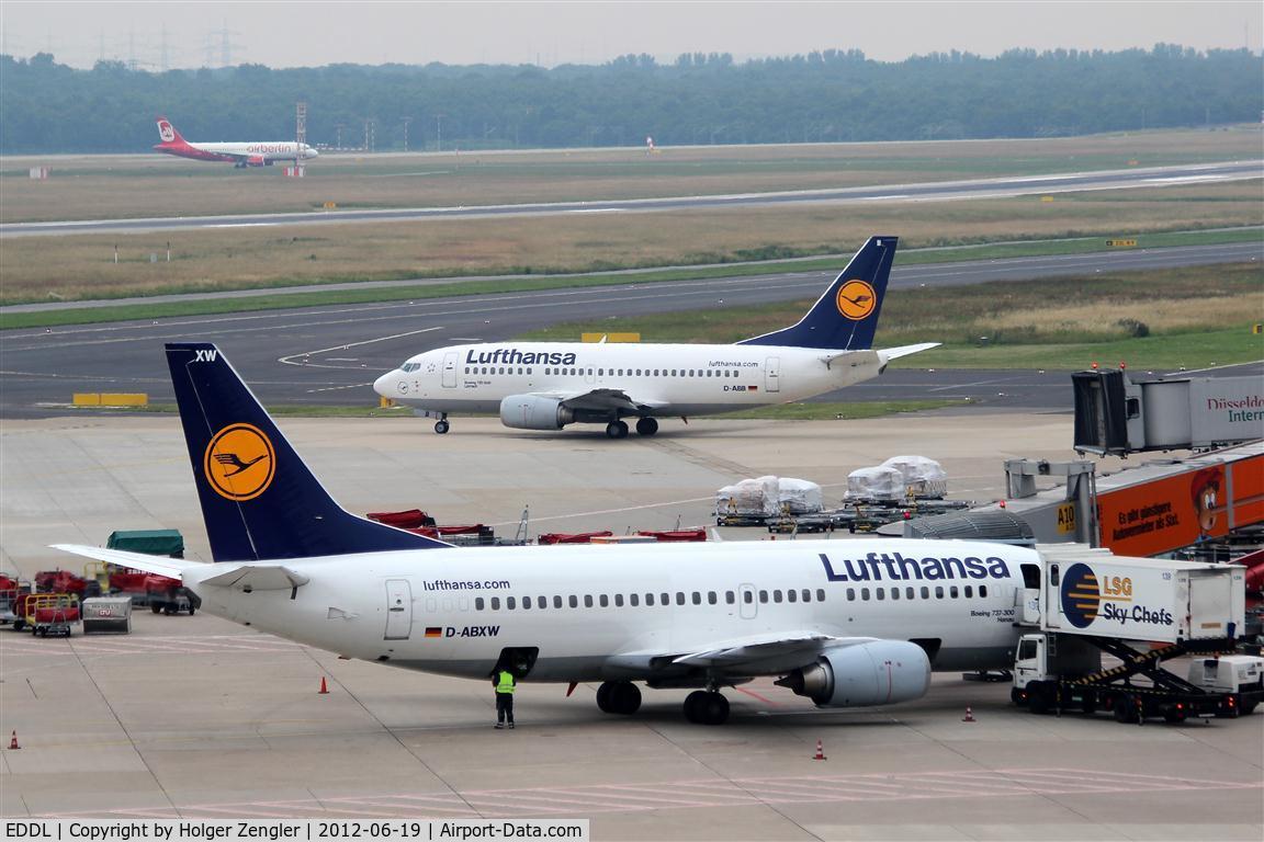 Düsseldorf International Airport, Düsseldorf Germany (EDDL) - Preparations at gate 10, lining up for rwy 05R and an arrival on rwy 05L on one pic.