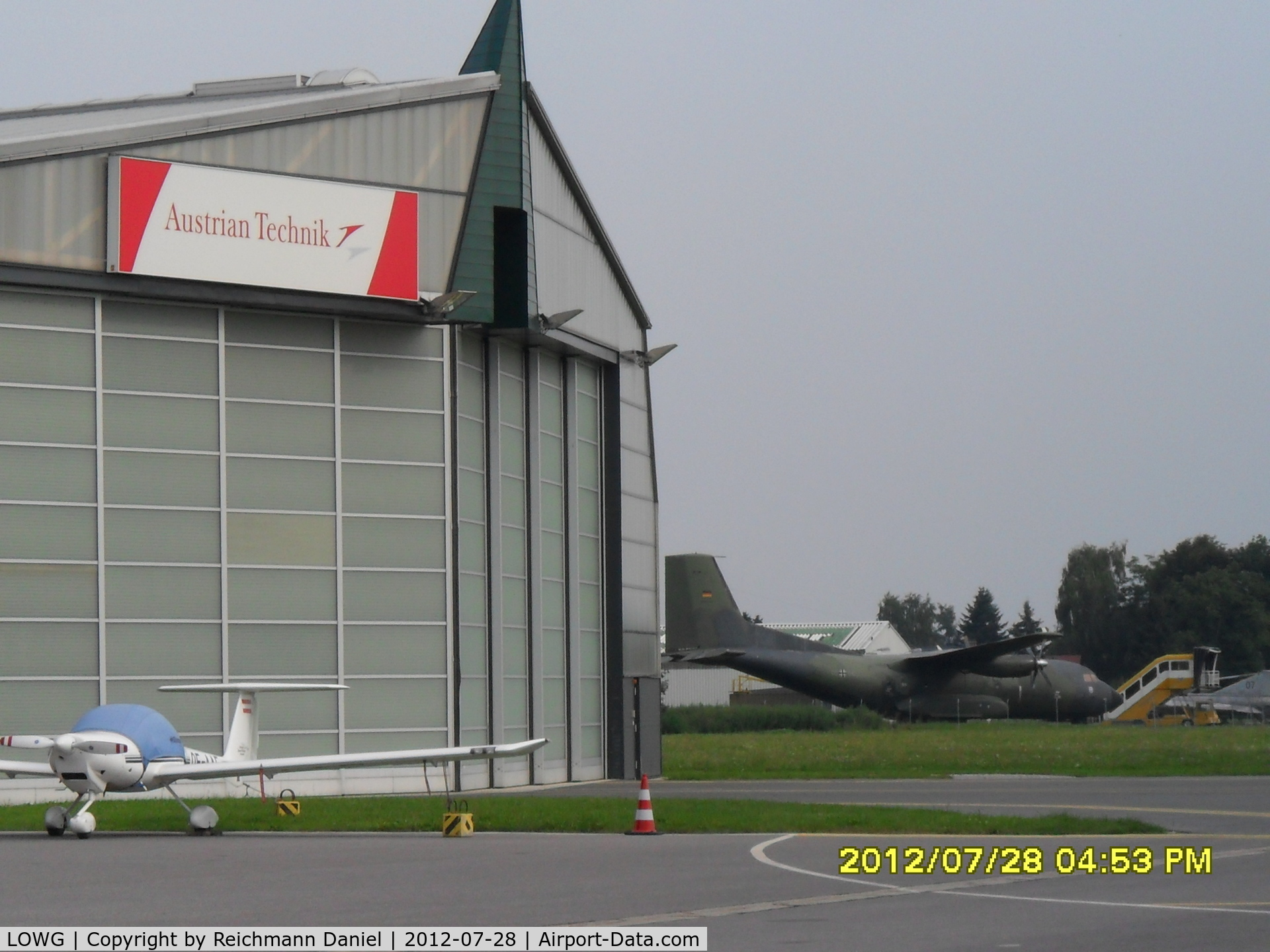 Graz Airport, Graz Austria (LOWG) - The Austrian Technik with the transall c-160 in the background :)