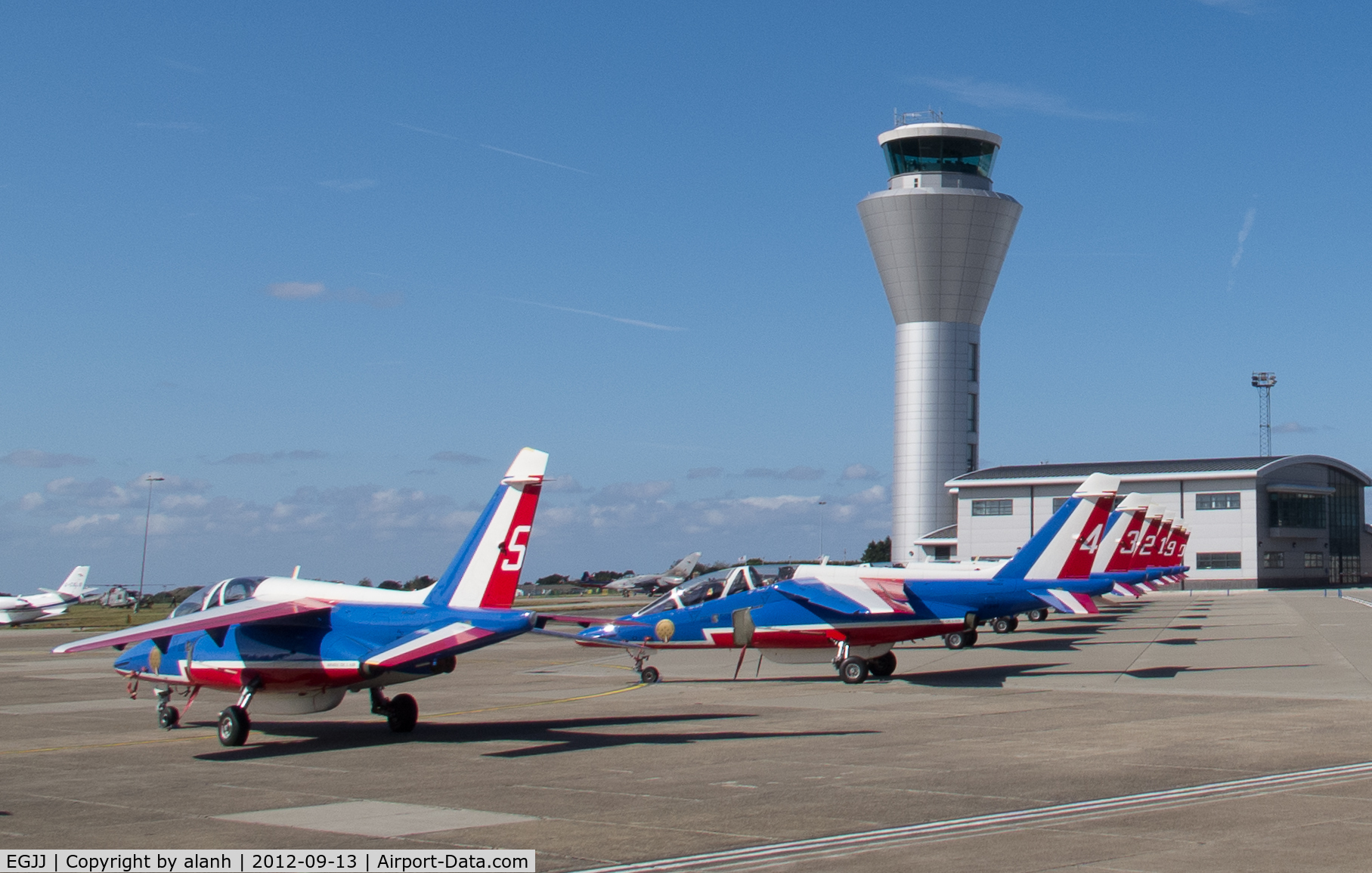 Jersey Airport, Jersey, Channel Islands United Kingdom (EGJJ) - Alpha Jets of the Patrouille de France lined up on Jersey Air Show day, 2012