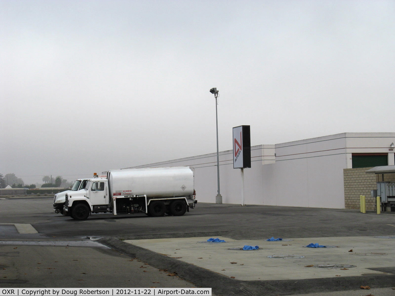 Oxnard Airport (OXR) - New fuel supplier-AVFUEL replaced BP Fuel at Golden West Aviation fuel dock for 100LL. Jet-A and Jet-A-Prist. Foggy day.