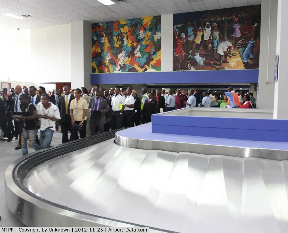 Port-au-Prince International Airport (Toussaint Louverture Int'l), Port-au-Prince Haiti (MTPP) - Haitian President Michel Martelly during the inauguration of the Arrival area of the Toussaint Louverture International Airport of Port-au-Prince