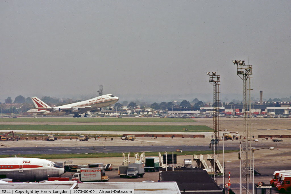 London Heathrow Airport, London, England United Kingdom (EGLL) - A 747-400, one of Air India's fleet of 6 aircraft, lifts off at Heathrow. The airports never ending alterations continue to take place in the foreground.