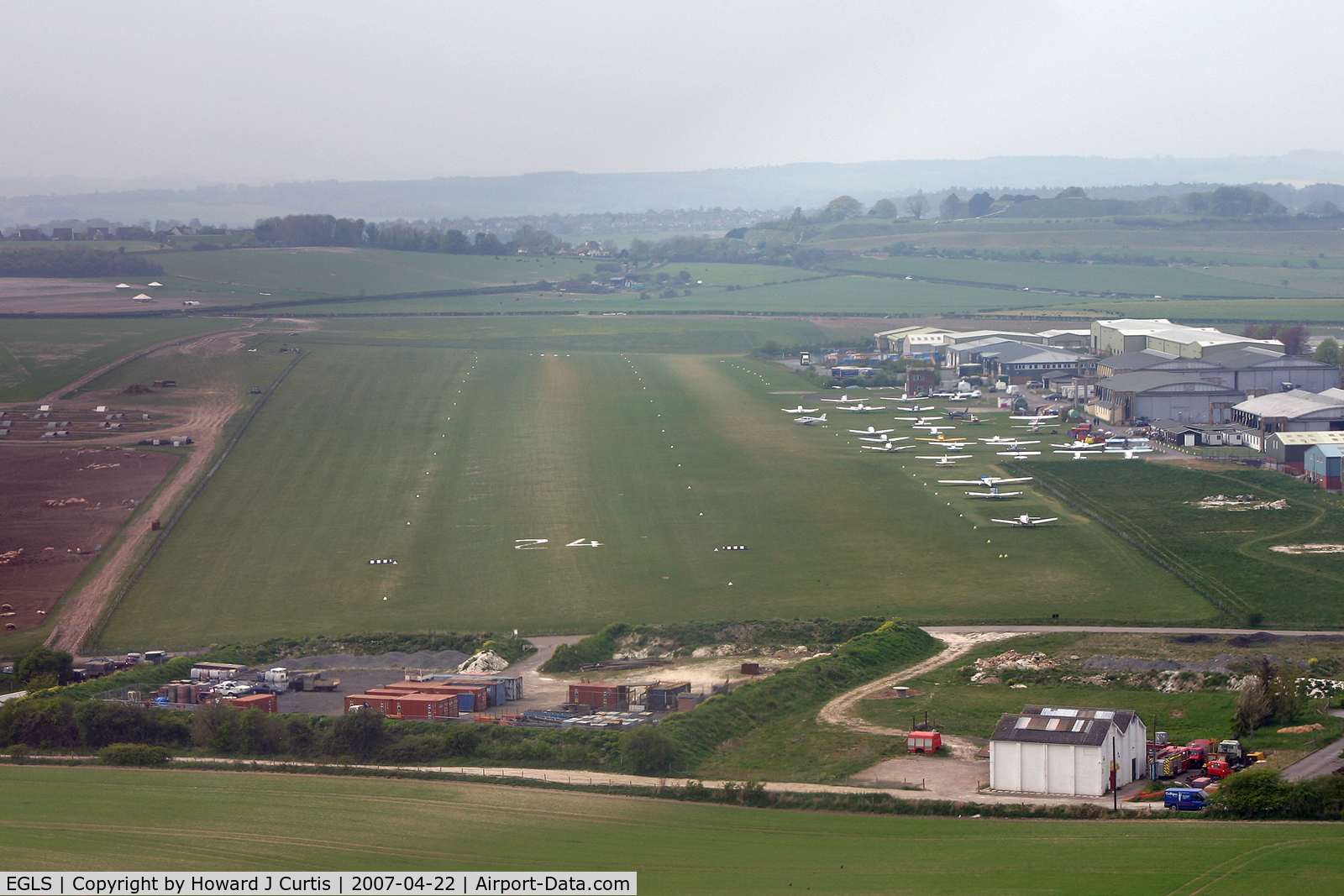 Old Sarum Airfield Airport, Salisbury, England United Kingdom (EGLS) - On finals to runway 24 in Cessna 172E G-ASSS, flown by my good friend Peter R March.