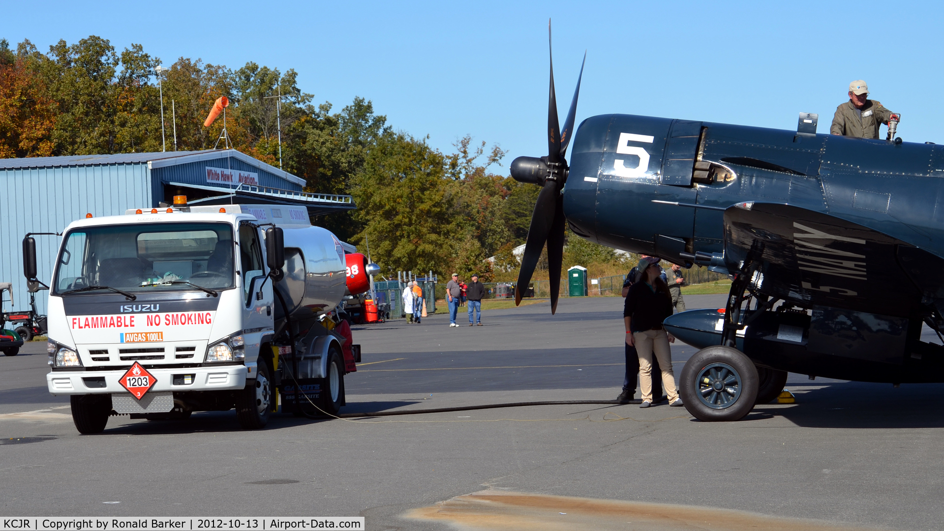 Culpeper Regional Airport (CJR) - Fuel truck refueing F4U-4NL - Culpeper Air Fest 2012