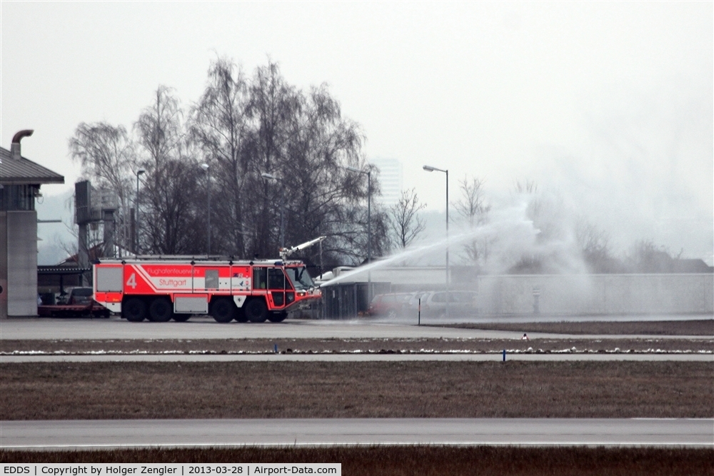 Stuttgart Echterdingen Airport, Stuttgart Germany (EDDS) - Fire engine no. 4 produces water mist.....