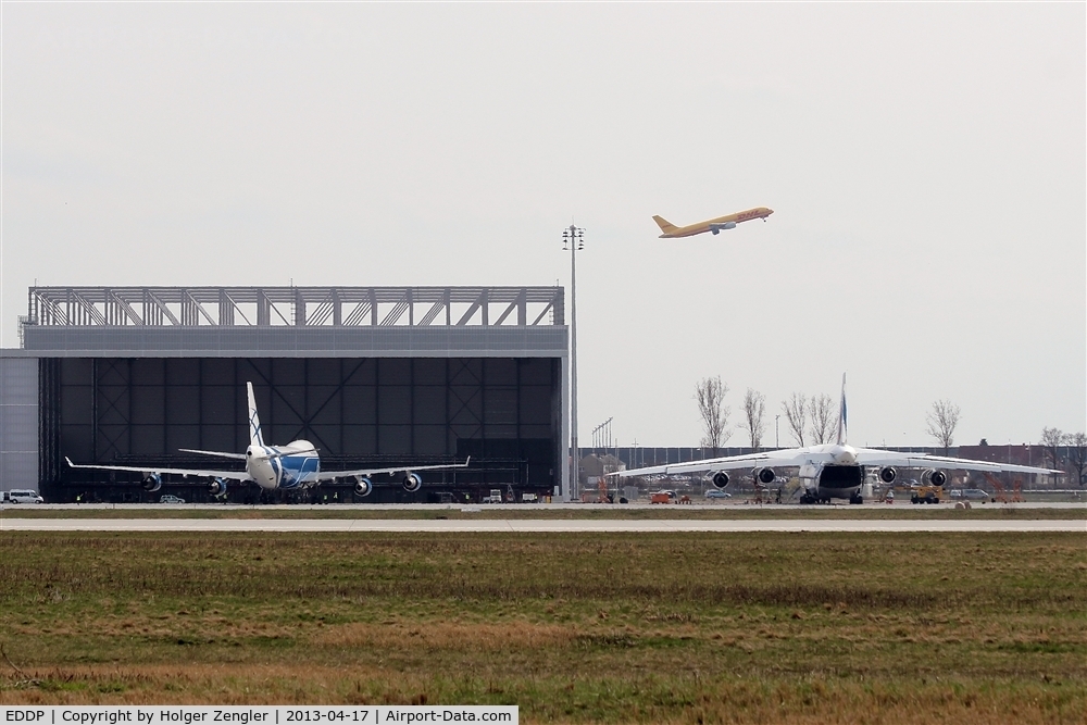 Leipzig/Halle Airport, Leipzig/Halle Germany (EDDP) - Activity on apron 3 and outbound traffic above rwy 26L....
