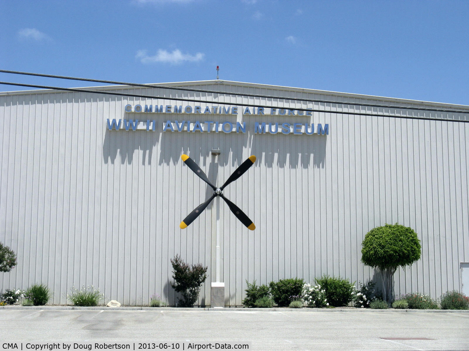 Camarillo Airport (CMA) - Commemorative Air Force-Southern California Wing-Hangar One with added four-blade prop. Impressive! I was told this huge prop came from a Lockheed C-130 Hercules.