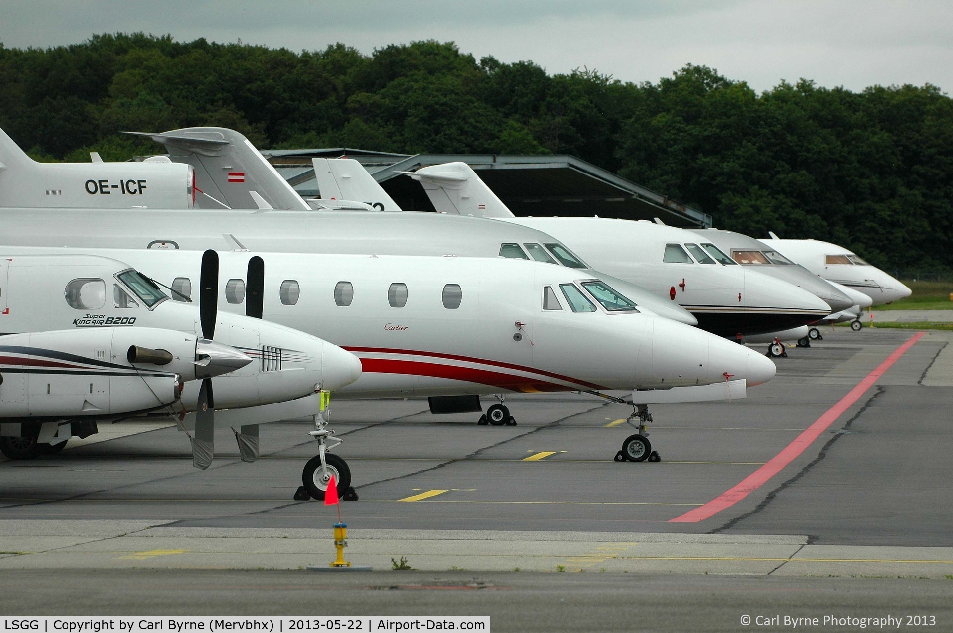 Geneva Cointrin International Airport, Geneva Switzerland (LSGG) - A line up of aircraft on the RUAG ramp