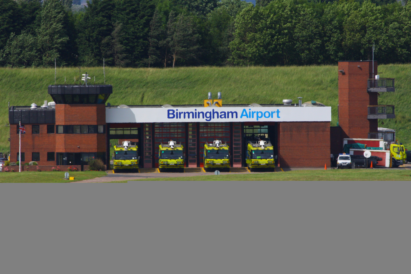 Birmingham International Airport, Birmingham, England United Kingdom (EGBB) - new sign on the Birmingham fire station