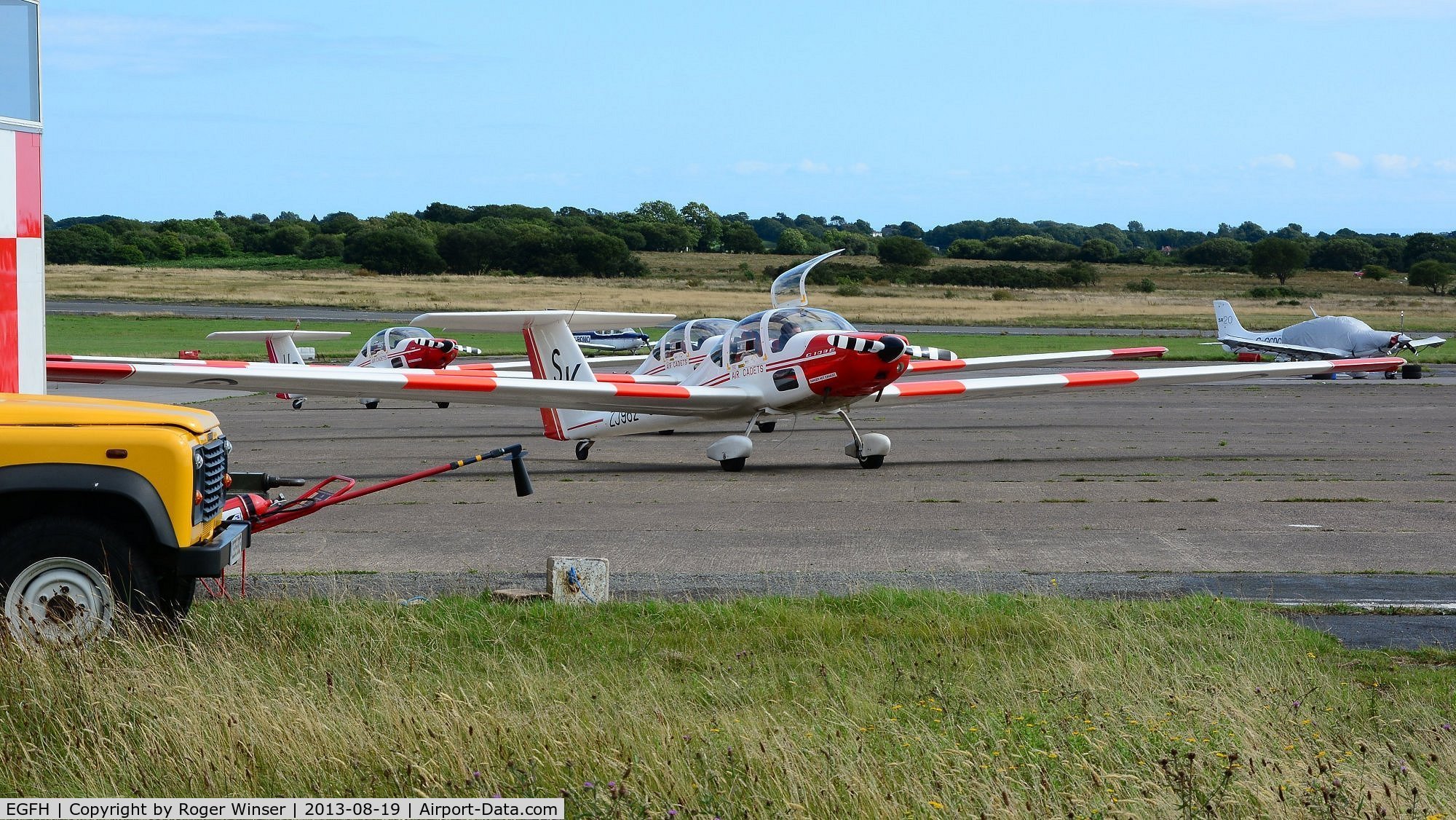 Swansea Airport, Swansea, Wales United Kingdom (EGFH) - Three Air Cadets motor gliders on the apron at Swansea Airport.