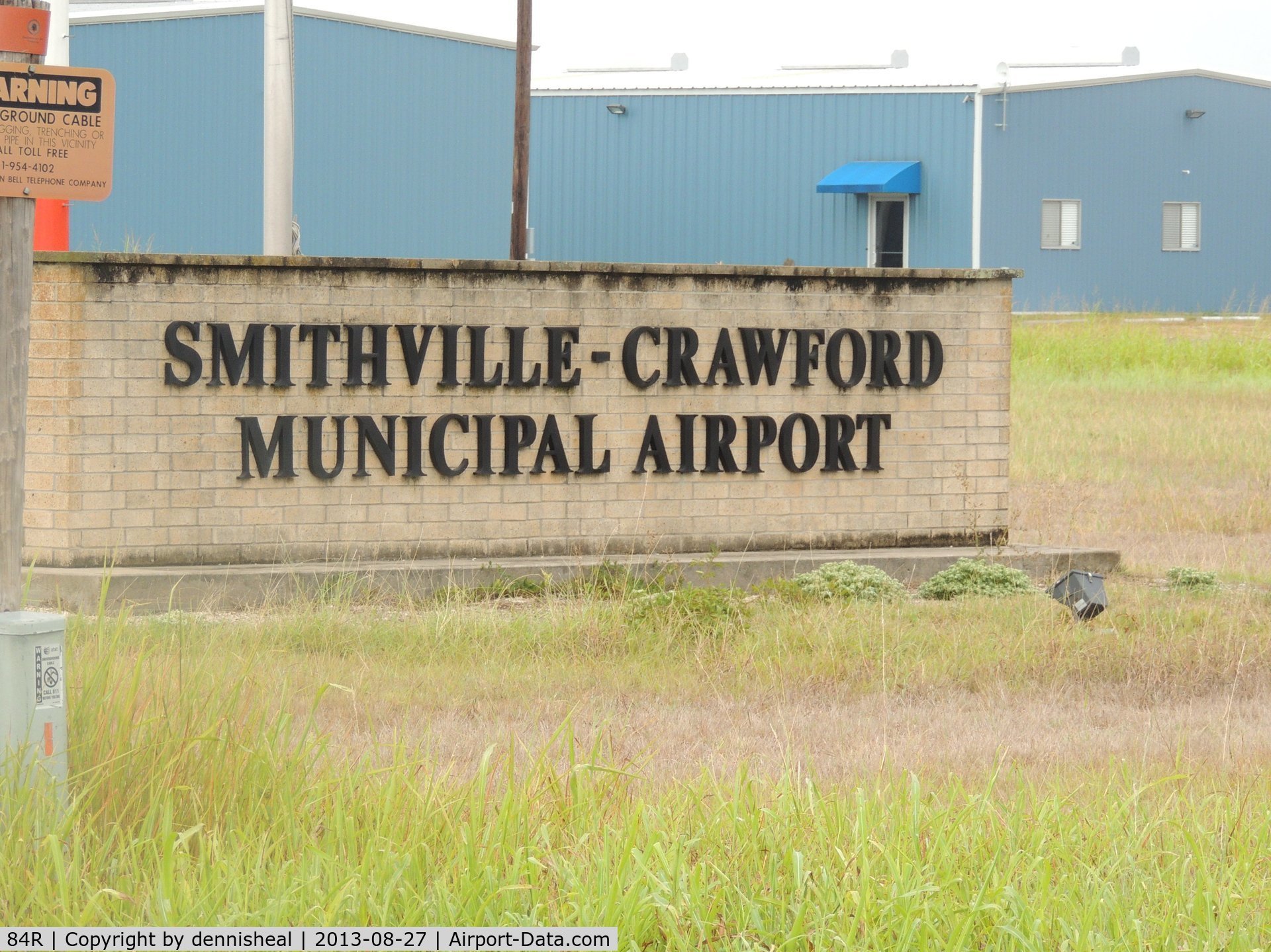 Smithville Crawford Municipal Airport (84R) - SIGN AT ENTRANCE TO SMITHVILLE-CRAWFORD MUNICIPAL AIRPORT