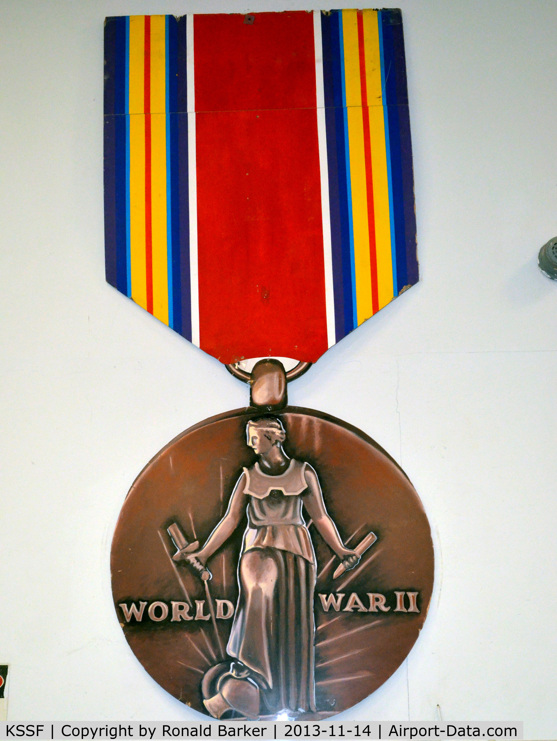 Stinson Municipal Airport (SSF) - Giant size US World War II Victory Medal at the Texas Air Museum