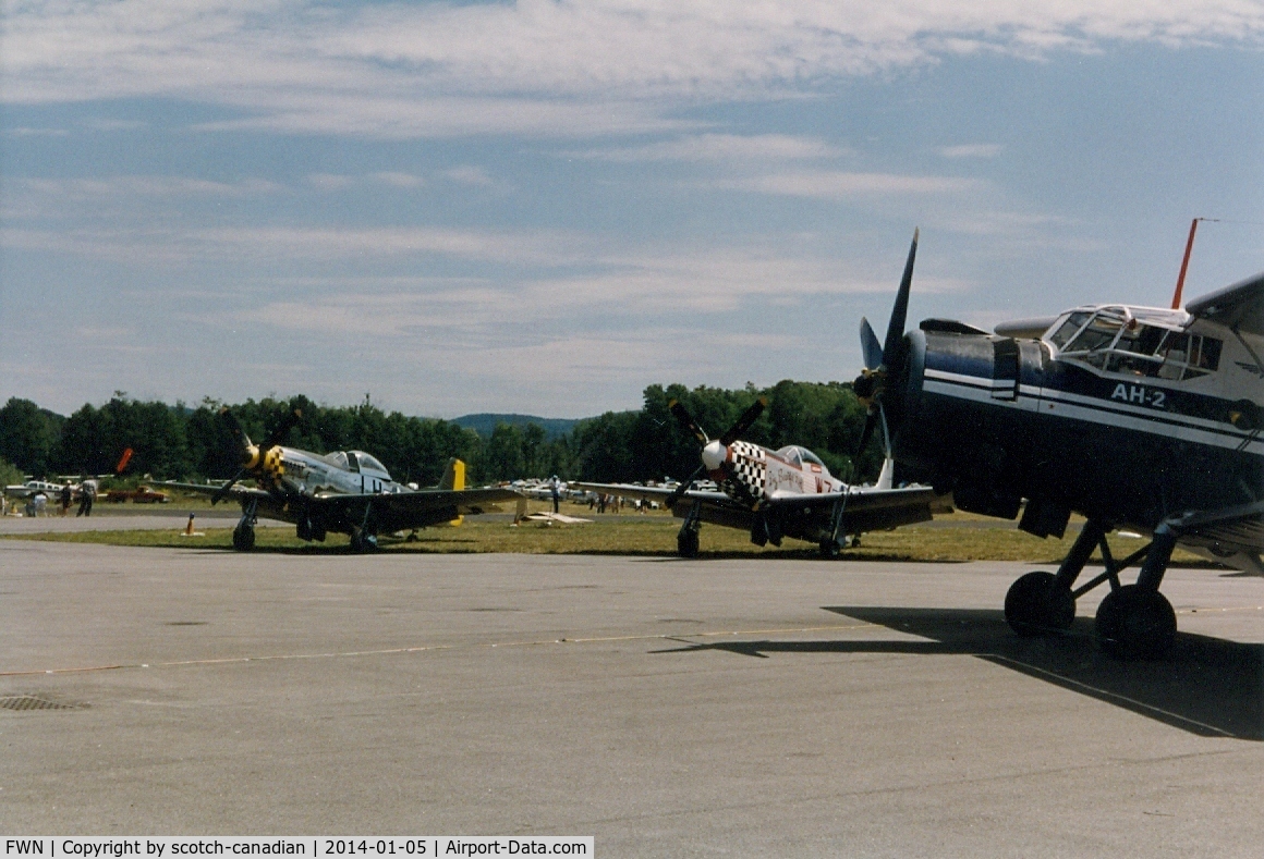 Sussex Airport (FWN) - A pair of North American P51-D Mustangs and an 1970 Antonov AN-2 at the 1993 Sussex Air Show, Sussex, NJ 