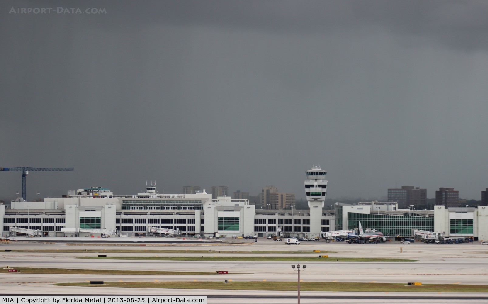 Miami International Airport (MIA) - Miami's American Airlines terminal with storm to the south