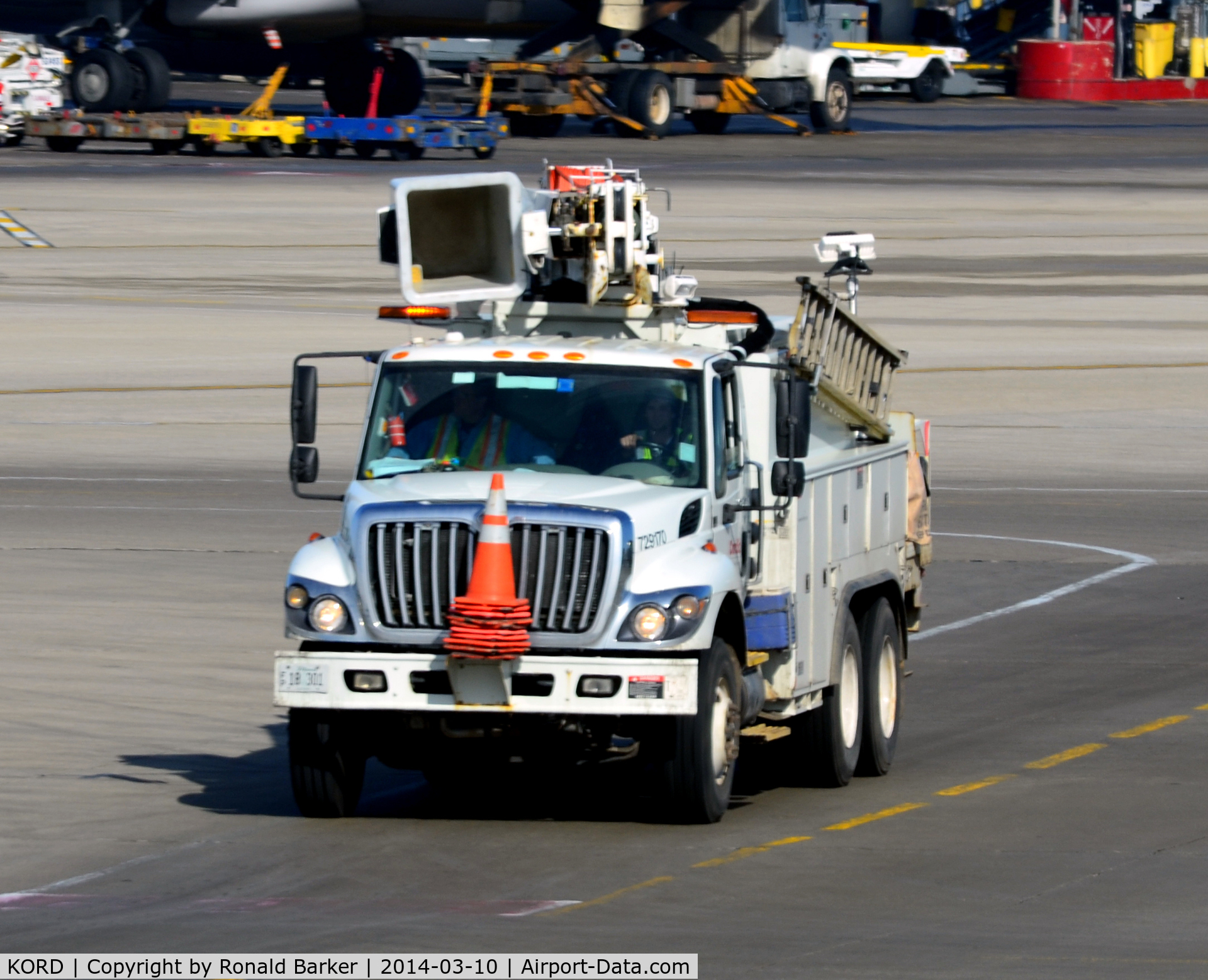 Chicago O'hare International Airport (ORD) - Deicing truck approaching at O'Hare