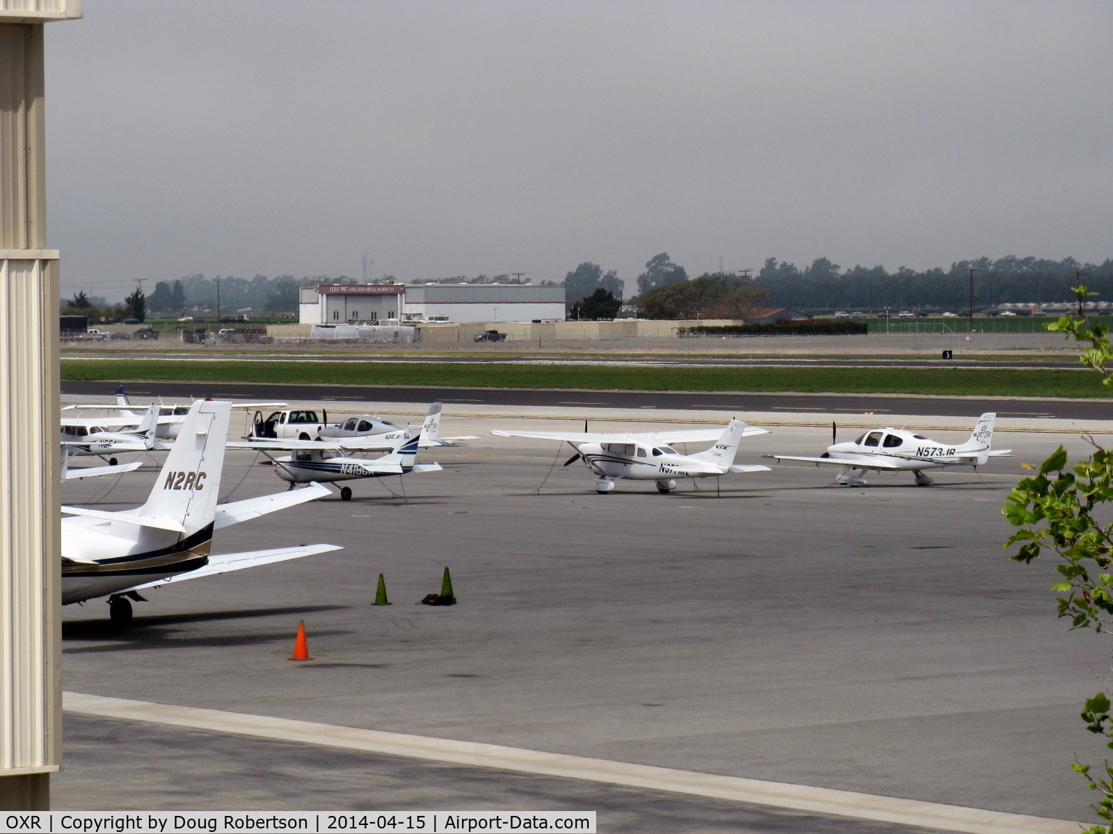 Oxnard Airport (OXR) - Unusually occupied GA ramp because nearby Camarillo CMA's sole runway is closed for maintenance. CMA tower diverting aircraft to OXR with some CMA-based aircraft departing early to OXR before the closure