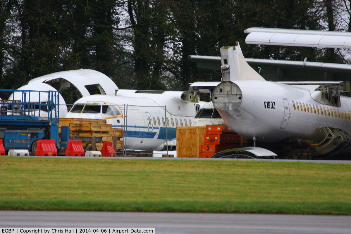 Kemble Airport, Kemble, England United Kingdom (EGBP) - from L to R B-5091 B737 cockpit and three ATR's SX-BIB, SX-BID and N19DZ in the scrapping area at Kemble