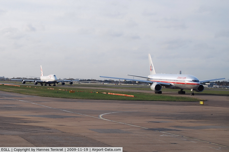 London Heathrow Airport, London, England United Kingdom (EGLL) - American Airlines Boeing 777-200 & British Airways Boeing 747-400