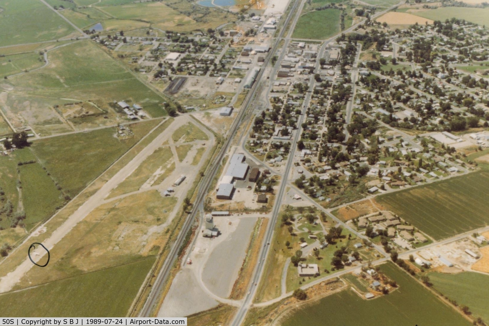 Parma Airport (50S) - Nice dirt runway back in 1989. Aeronca 68E can be seen landing.