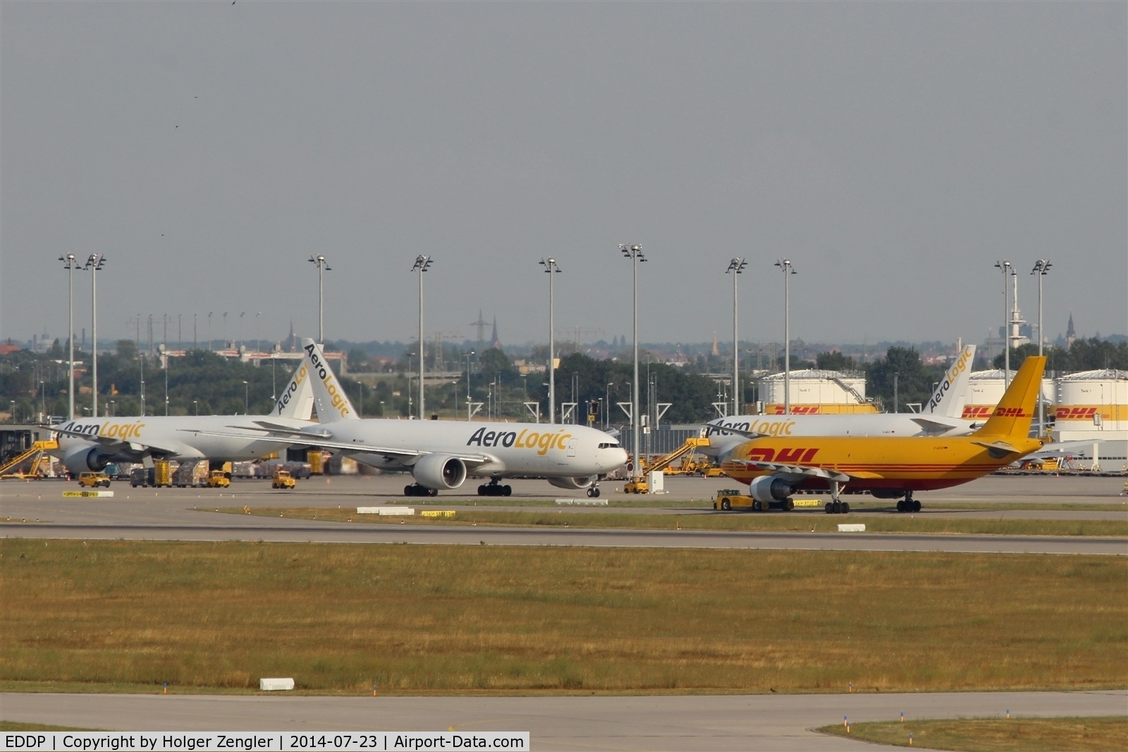 Leipzig/Halle Airport, Leipzig/Halle Germany (EDDP) - View over rwy 08R to apron 5 (DHL area) and Leipzig city...