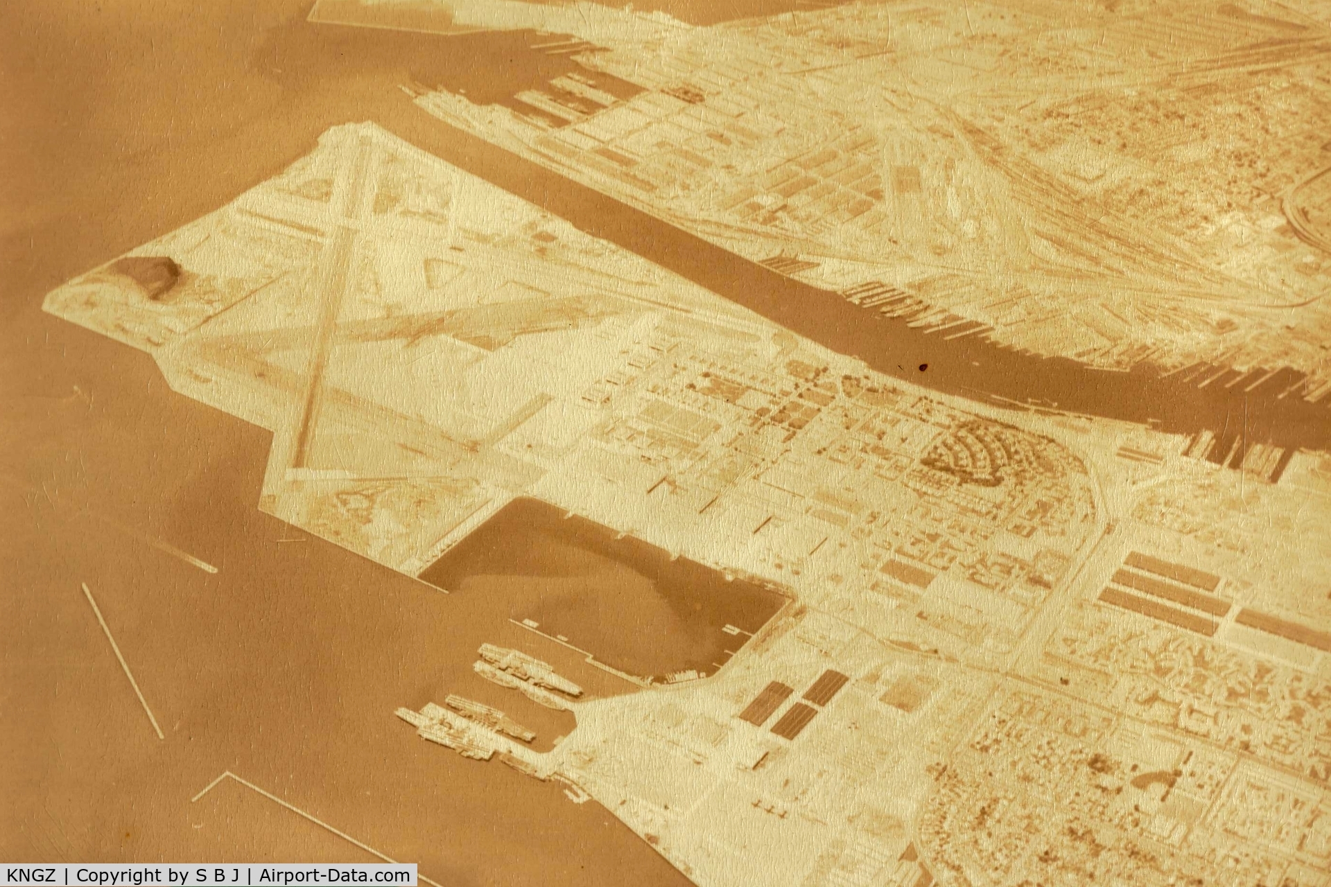 NGZ Airport - Alameda around 1955-60 when the SF Bay Area had a heavy military presence. Is the 3 carriers at the bottom of picture where the Doolittle Raiders put on the carrier Hornet?