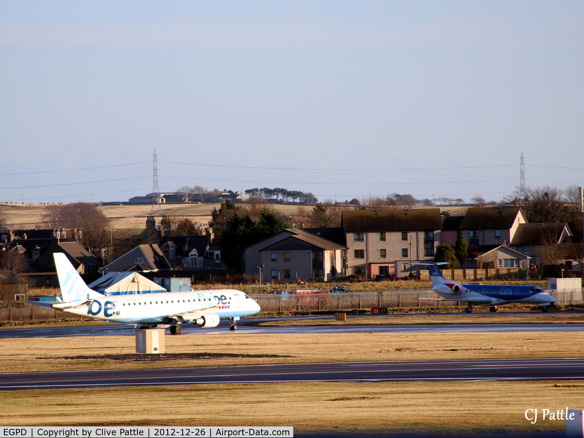 Aberdeen Airport, Aberdeen, Scotland United Kingdom (EGPD) - Last rays of winter sun highlight the runway threshold